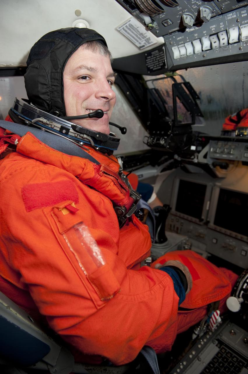 CAPE CANAVERAL, Fla. -- STS-134 Pilot Greg H. Johnson gets behind the controls of a Shuttle Training Aircraft (STA) to perform touch-and-go landings on the Shuttle Landing Facility at NASA's Kennedy Space Center in Florida. STAs are Gulfstream II business jets that are modified to mimic the shuttle's handling during the final phase of landing. Practice landings are part of standard training before space shuttle Endeavour's STS-134 launch to the International Space Station. Endeavour's six crew members are at Kennedy for the launch countdown dress rehearsal called the Terminal Countdown Demonstration Test (TCDT) and related training. Targeted to launch April 19 at 7:48 p.m. EDT, they will deliver the Express Logistics Carrier-3, Alpha Magnetic Spectrometer-2 (AMS), a high-pressure gas tank, additional spare parts for the Dextre robotic helper and micrometeoroid debris shields to the space station. This will be the final spaceflight for Endeavour. For more information visit, www.nasa.gov/mission_pages/shuttle/shuttlemissions/sts134/index.html. Photo credit: NASA/Kim Shiflett