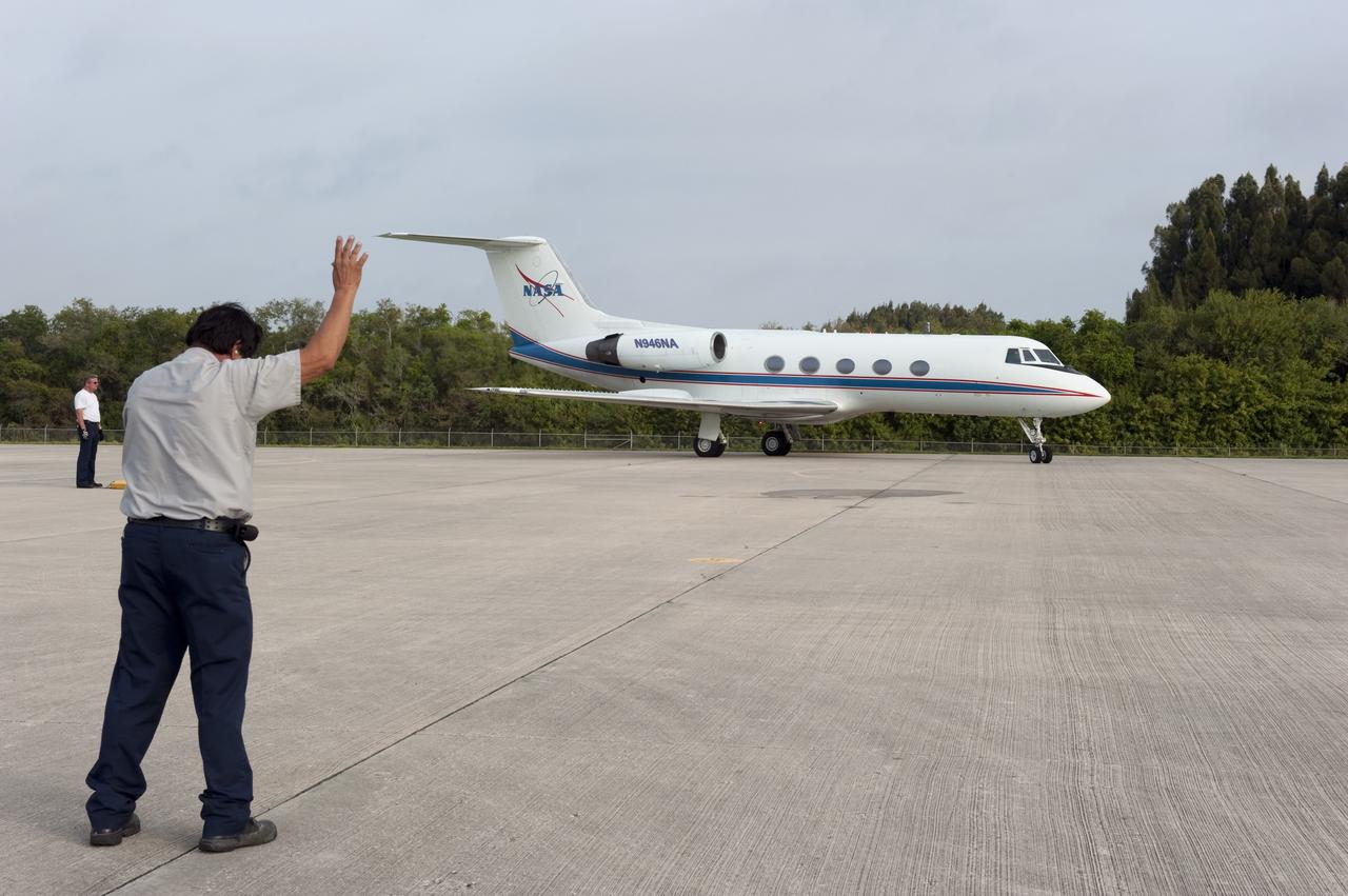 CAPE CANAVERAL, Fla. -- STS-134 Commander Mark Kelly prepares to take flight in a Shuttle Training Aircraft (STA) to perform touch-and-go landings on the Shuttle Landing Facility at NASA's Kennedy Space Center in Florida. STAs are Gulfstream II business jets that are modified to mimic the shuttle's handling during the final phase of landing. Practice landings are part of standard training before space shuttle Endeavour's STS-134 launch to the International Space Station. Endeavour's six crew members are at Kennedy for the launch countdown dress rehearsal called the Terminal Countdown Demonstration Test (TCDT) and related training. Targeted to launch April 19 at 7:48 p.m. EDT, they will deliver the Express Logistics Carrier-3, Alpha Magnetic Spectrometer-2 (AMS), a high-pressure gas tank, additional spare parts for the Dextre robotic helper and micrometeoroid debris shields to the space station. This will be the final spaceflight for Endeavour. For more information visit, www.nasa.gov/mission_pages/shuttle/shuttlemissions/sts134/index.html. Photo credit: NASA/Kim Shiflett