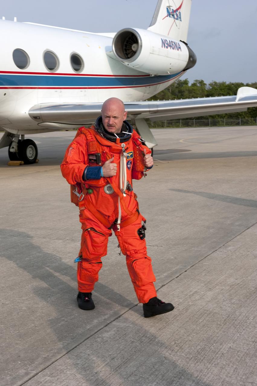 CAPE CANAVERAL, Fla. -- STS-134 Commander Mark Kelly completes touch-and-go landings aboard a Shuttle Training Aircraft (STA) on the Shuttle Landing Facility at NASA's Kennedy Space Center in Florida. STAs are Gulfstream II business jets that are modified to mimic the shuttle's handling during the final phase of landing. Practice landings are part of standard training before space shuttle Endeavour's STS-134 launch to the International Space Station. Endeavour's six crew members are at Kennedy for the launch countdown dress rehearsal called the Terminal Countdown Demonstration Test (TCDT) and related training. Targeted to launch April 19 at 7:48 p.m. EDT, they will deliver the Express Logistics Carrier-3, Alpha Magnetic Spectrometer-2 (AMS), a high-pressure gas tank, additional spare parts for the Dextre robotic helper and micrometeoroid debris shields to the space station. This will be the final spaceflight for Endeavour. For more information visit, www.nasa.gov/mission_pages/shuttle/shuttlemissions/sts134/index.html. Photo credit: NASA/Kim Shiflett