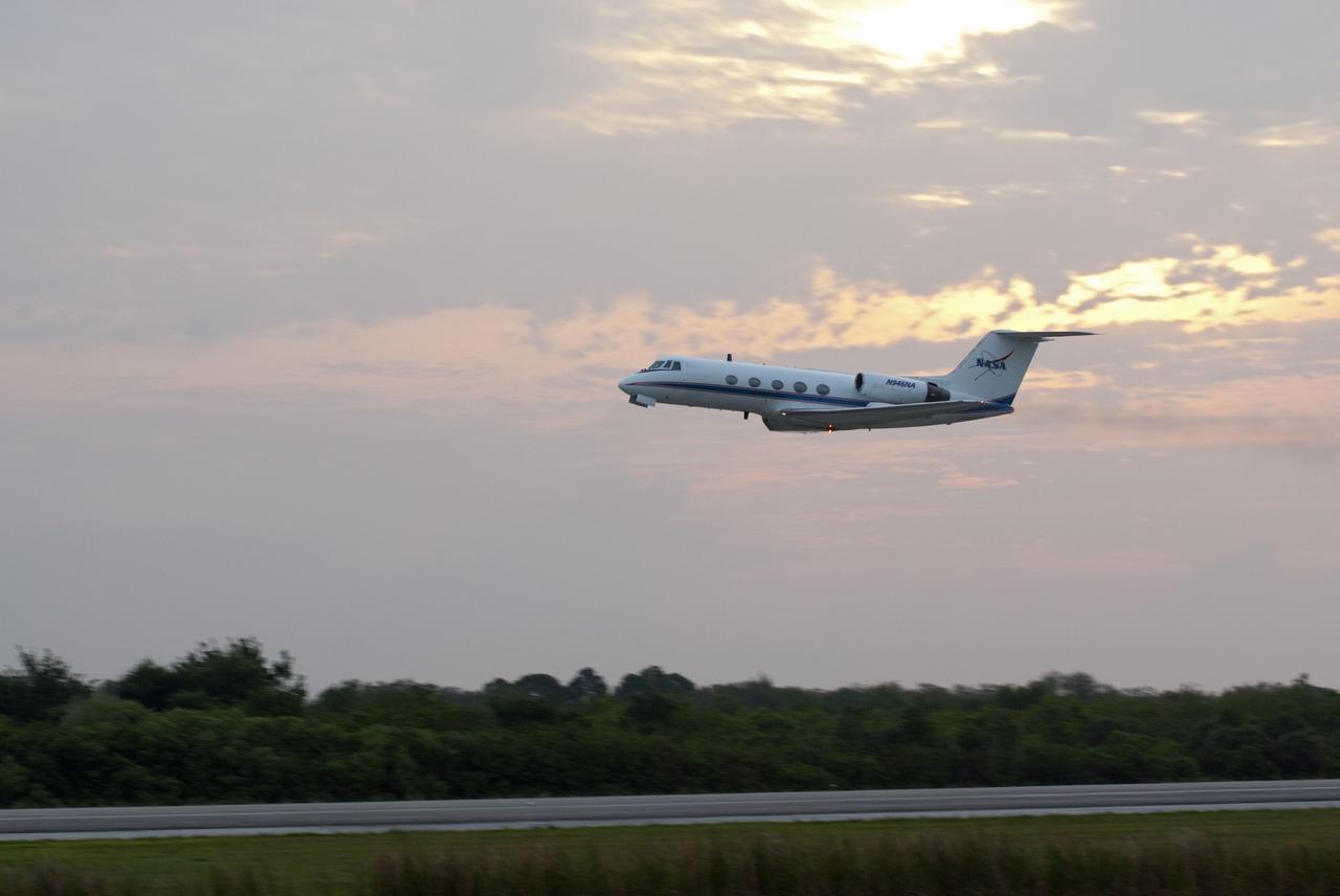 CAPE CANAVERAL, Fla. -- STS-134 Commander Mark Kelly performs touch-and-go landings aboard a Shuttle Training Aircraft (STA) on the Shuttle Landing Facility at NASA's Kennedy Space Center in Florida. STAs are Gulfstream II business jets that are modified to mimic the shuttle's handling during the final phase of landing. Practice landings are part of standard training before space shuttle Endeavour's upcoming STS-134 launch to the International Space Station. Endeavour's six crew members are at Kennedy for the launch countdown dress rehearsal called the Terminal Countdown Demonstration Test (TCDT) and related training. Targeted to launch April 19 at 7:48 p.m. EDT, they will deliver the Express Logistics Carrier-3, Alpha Magnetic Spectrometer-2 (AMS), a high-pressure gas tank, additional spare parts for the Dextre robotic helper and micrometeoroid debris shields to the space station. This will be the final spaceflight for Endeavour. For more information visit, www.nasa.gov/mission_pages/shuttle/shuttlemissions/sts134/index.html. Photo credit: NASA/Kim Shiflett