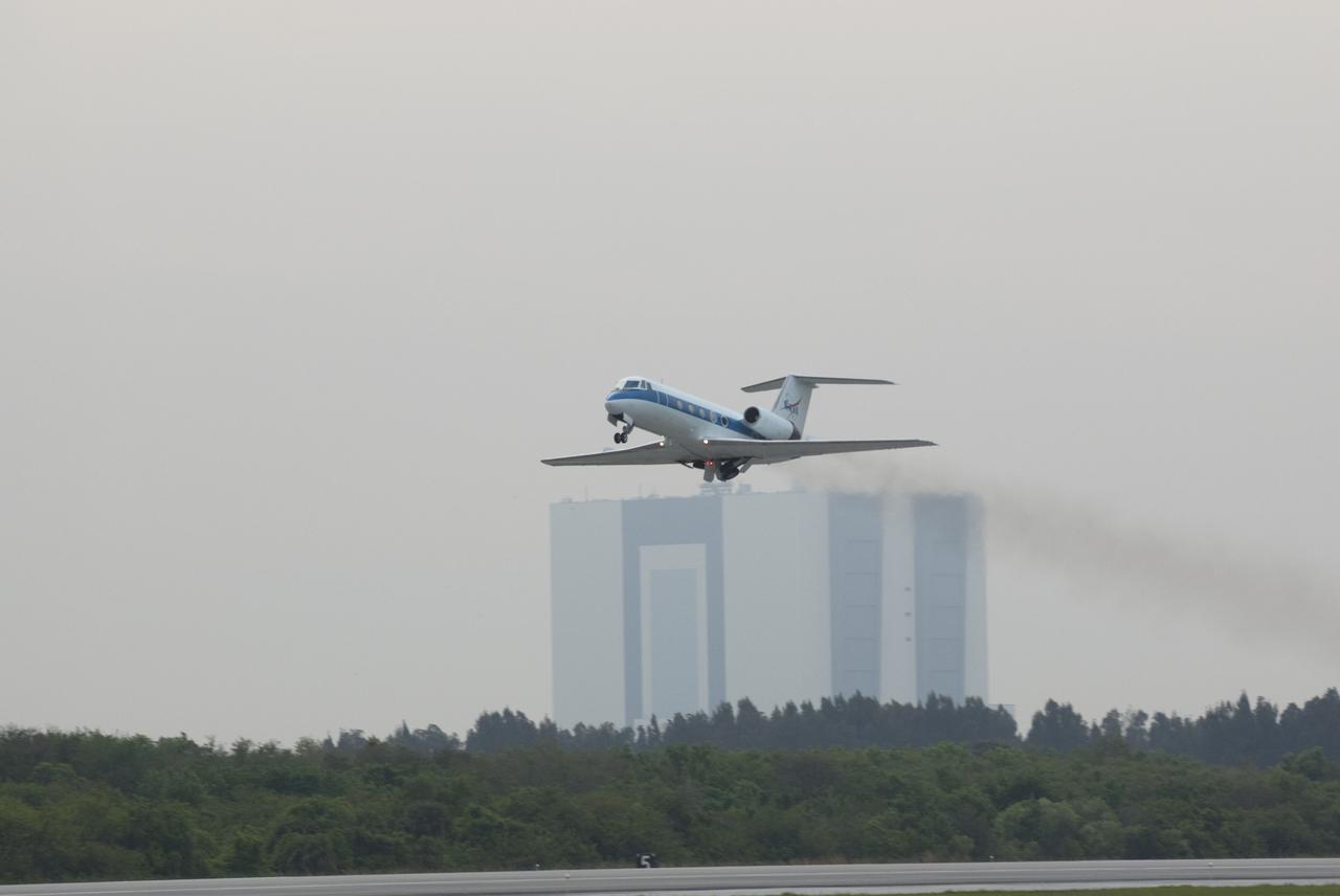 CAPE CANAVERAL, Fla. -- STS-134 Pilot Greg H. Johnson performs touch-and-go landings aboard a Shuttle Training Aircraft (STA) on the Shuttle Landing Facility at NASA's Kennedy Space Center in Florida. STAs are Gulfstream II business jets that are modified to mimic the shuttle's handling during the final phase of landing. Practice landings are part of standard training before space shuttle Endeavour's upcoming STS-134 launch to the International Space Station. Endeavour's six crew members are at Kennedy for the launch countdown dress rehearsal called the Terminal Countdown Demonstration Test (TCDT) and related training. Targeted to launch April 19 at 7:48 p.m. EDT, they will deliver the Express Logistics Carrier-3, Alpha Magnetic Spectrometer-2 (AMS), a high-pressure gas tank, additional spare parts for the Dextre robotic helper and micrometeoroid debris shields to the space station. This will be the final spaceflight for Endeavour. For more information visit, www.nasa.gov/mission_pages/shuttle/shuttlemissions/sts134/index.html. Photo credit: NASA/Kim Shiflett