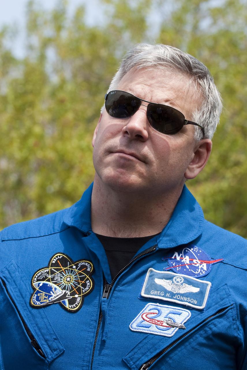 CAPE CANAVERAL, Fla. - STS-134 Pilot Greg H. Johnson listens intently to instruction during M113 armored personnel carrier training at NASA's Kennedy Space Center in Florida. An M113 is kept at the foot of the launch pad in case an emergency exit from the pad is needed and every shuttle crew is trained on driving the vehicle before launch.           Space shuttle Endeavour's six crew members are at Kennedy for the launch countdown dress rehearsal called the Terminal Countdown Demonstration Test (TCDT) and related training. Targeted to launch April 19 at 7:48 p.m. EDT, they will deliver the Express Logistics Carrier-3, Alpha Magnetic Spectrometer-2 (AMS), a high-pressure gas tank, additional spare parts for the Dextre robotic helper and micrometeoroid debris shields to the space station. This is the final scheduled spaceflight for Endeavour. For more information visit, www.nasa.gov/mission_pages/shuttle/shuttlemissions/sts134/index.html. Photo credit: NASA/Kim Shiflett