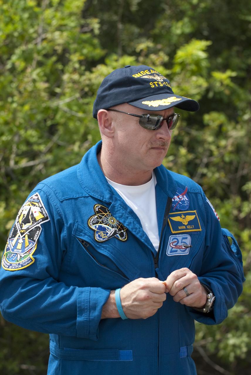 CAPE CANAVERAL, Fla. - STS-134 Commander Mark Kelly listens intently to instruction during M113 armored personnel carrier training at NASA's Kennedy Space Center in Florida. An M113 is kept at the foot of the launch pad in case an emergency exit from the pad is needed and every shuttle crew is trained on driving the vehicle before launch.         Space shuttle Endeavour's six crew members are at Kennedy for the launch countdown dress rehearsal called the Terminal Countdown Demonstration Test (TCDT) and related training. Targeted to launch April 19 at 7:48 p.m. EDT, they will deliver the Express Logistics Carrier-3, Alpha Magnetic Spectrometer-2 (AMS), a high-pressure gas tank, additional spare parts for the Dextre robotic helper and micrometeoroid debris shields to the space station. This is the final scheduled spaceflight for Endeavour. For more information visit, www.nasa.gov/mission_pages/shuttle/shuttlemissions/sts134/index.html. Photo credit: NASA/Kim Shiflett