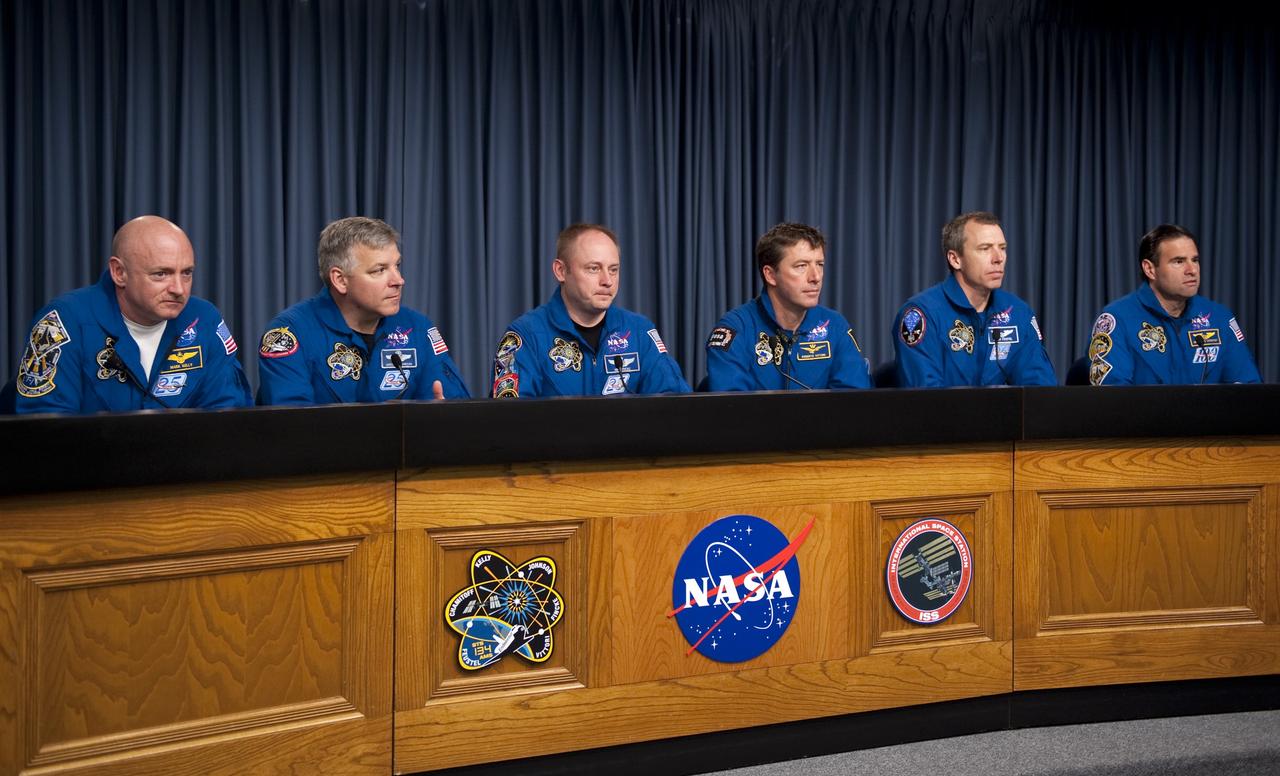 CAPE CANAVERAL, Fla. -- The STS-134 crew answers media questions in the Press Site TV auditorium at NASA's Kennedy Space Center in Florida. From left, are Commander Mark Kelly, Pilot Greg H. Johnson, and Mission Specialists Michael Fincke, European Space Agency astronaut Roberto Vittori, Andrew Feustel, and Greg Chamitoff. The crew was scheduled to answer questions at Launch Pad 39A, where space shuttle Endeavour is awaiting liftoff, but severe storms associated with a frontal system passing over Central Florida brought the media event indoors.            Endeavour's six crew members are at Kennedy for the launch countdown dress rehearsal called the Terminal Countdown Demonstration Test (TCDT) and related training. Targeted to launch April 19 at 7:48 p.m. EDT, they will deliver the Express Logistics Carrier-3, Alpha Magnetic Spectrometer-2 (AMS), a high-pressure gas tank, additional spare parts for the Dextre robotic helper and micrometeoroid debris shields to the International Space Station. This will be the final spaceflight for Endeavour. For more information visit, www.nasa.gov/mission_pages/shuttle/shuttlemissions/sts134/index.html. Photo credit: NASA/Kim Shiflett