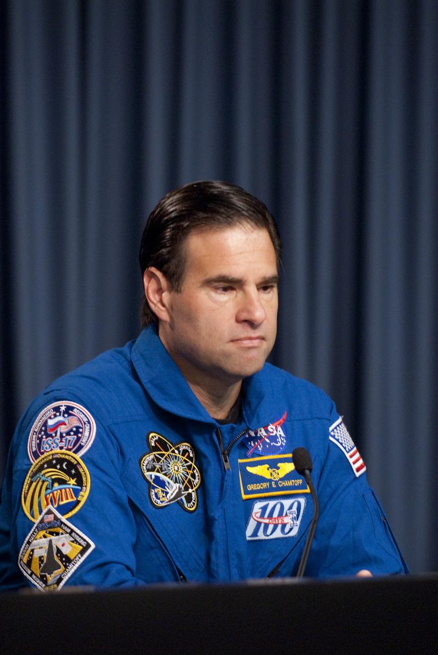 CAPE CANAVERAL, Fla. -- The STS-134 Mission Specialist Greg Chamitoff participates in a media question-and-answer session in the Press Site TV auditorium at NASA's Kennedy Space Center in Florida. The crew was scheduled to answer questions at Launch Pad 39A, where space shuttle Endeavour is awaiting liftoff, but severe storms associated with a frontal system passing over Central Florida brought the media event indoors.          Endeavour's six crew members are at Kennedy for the launch countdown dress rehearsal called the Terminal Countdown Demonstration Test (TCDT) and related training. Targeted to launch April 19 at 7:48 p.m. EDT, they will deliver the Express Logistics Carrier-3, Alpha Magnetic Spectrometer-2 (AMS), a high-pressure gas tank, additional spare parts for the Dextre robotic helper and micrometeoroid debris shields to the International Space Station. This is the final spaceflight for Endeavour. For more information visit, www.nasa.gov/mission_pages/shuttle/shuttlemissions/sts134/index.html. Photo credit: NASA/Kim Shiflett
