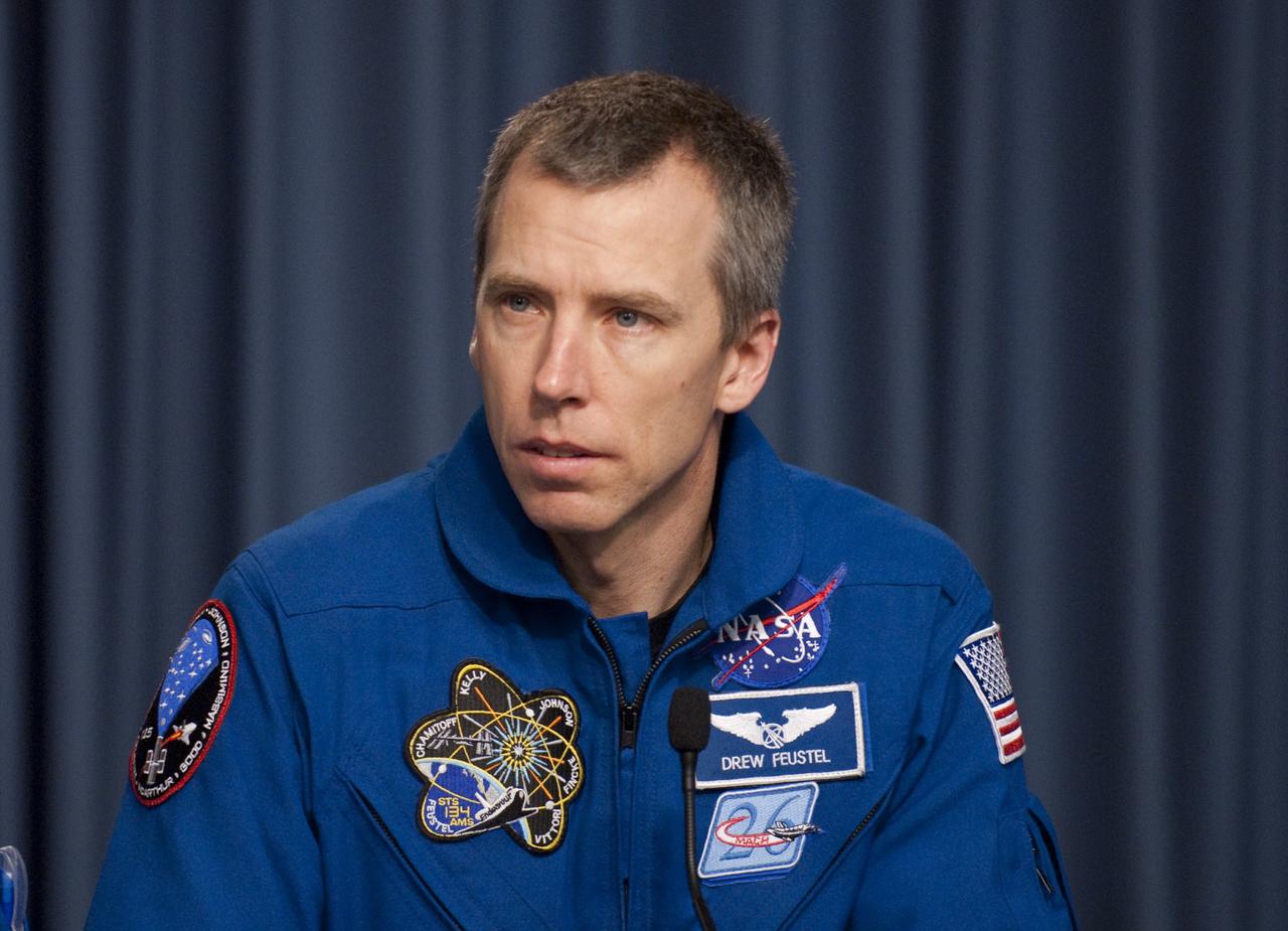 CAPE CANAVERAL, Fla. -- The STS-134 Mission Specialist Andrew Feustel participates in a media question-and-answer session in the Press Site TV auditorium at NASA's Kennedy Space Center in Florida. The crew was scheduled to answer questions at Launch Pad 39A, where space shuttle Endeavour is awaiting liftoff, but severe storms associated with a frontal system passing over Central Florida brought the media event indoors.          Endeavour's six crew members are at Kennedy for the launch countdown dress rehearsal called the Terminal Countdown Demonstration Test (TCDT) and related training. Targeted to launch April 19 at 7:48 p.m. EDT, they will deliver the Express Logistics Carrier-3, Alpha Magnetic Spectrometer-2 (AMS), a high-pressure gas tank, additional spare parts for the Dextre robotic helper and micrometeoroid debris shields to the International Space Station. This is the final spaceflight for Endeavour. For more information visit, www.nasa.gov/mission_pages/shuttle/shuttlemissions/sts134/index.html. Photo credit: NASA/Kim Shiflett