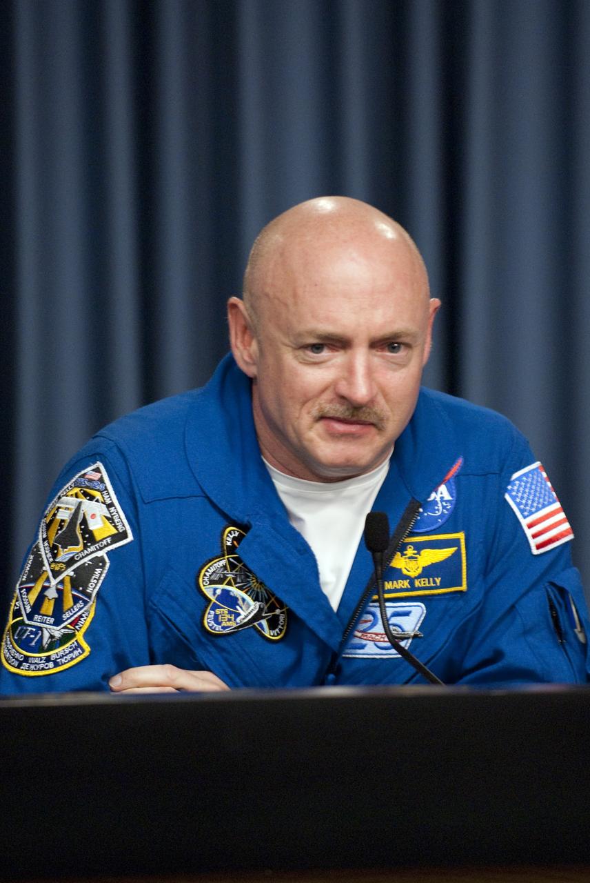 CAPE CANAVERAL, Fla. -- The STS-134 Commander Mark Kelly participates in a media question-and-answer session in the Press Site TV auditorium at NASA's Kennedy Space Center in Florida. The crew was scheduled to answer questions at Launch Pad 39A, where space shuttle Endeavour is awaiting liftoff, but severe storms associated with a frontal system passing over Central Florida brought the media event indoors.        Endeavour's six crew members are at Kennedy for the launch countdown dress rehearsal called the Terminal Countdown Demonstration Test (TCDT) and related training. Targeted to launch April 19 at 7:48 p.m. EDT, they will deliver the Express Logistics Carrier-3, Alpha Magnetic Spectrometer-2 (AMS), a high-pressure gas tank, additional spare parts for the Dextre robotic helper and micrometeoroid debris shields to the International Space Station. This is the final spaceflight for Endeavour. For more information visit, www.nasa.gov/mission_pages/shuttle/shuttlemissions/sts134/index.html. Photo credit: NASA/Kim Shiflett