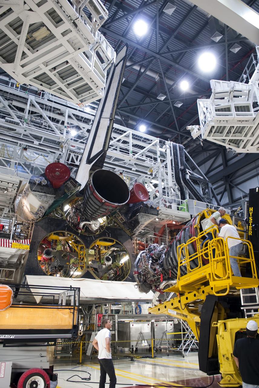 CAPE CANAVERAL, Fla. - Technicians complete the removal of main engine No. 3 from space shuttle Discovery using a specially designed engine installer, called a Hyster forklift. The work is taking place in Orbiter Processing Facility-2 at NASA's Kennedy Space Center in Florida. The removal is part of Discovery's transition and retirement processing. Work performed on Discovery is expected to help rocket designers build next-generation spacecraft and prepare the shuttle for future public display.      NASA/Jim Grossmann