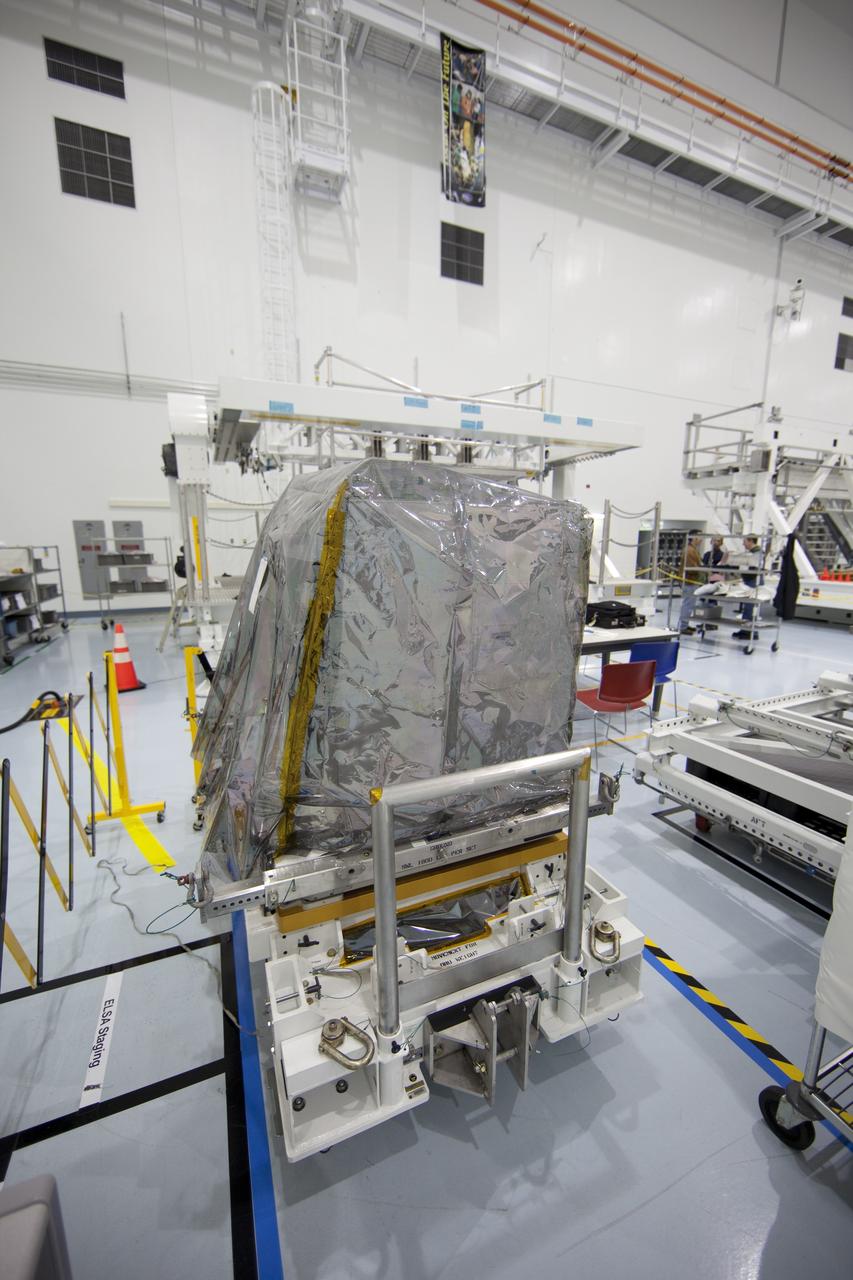 CAPE CANAVERAL, Fla. -- In the Space Station Processing Facility at NASA's Kennedy Space Center in Florida, a system that will investigate the potential for robotically refueling existing spacecraft in orbit will be moved into the Lightweight Multi-Purpose Experiment Support Structure Carrier (LMC). Called the Robotic Refueling Mission (RRM), the system is being processed to fly aboard space shuttle Atlantis in the LMC on the STS-135 mission to the International Space Station. Also going up will be the Raffaello multipurpose logistics module packed with supplies, logistics and spare parts. The mission also will return a failed ammonia pump module to help NASA better understand the failure mechanism and improve pump designs for future systems. STS-135, targeted to launch June 28, will be the 33rd flight of Atlantis, the 37th shuttle mission to the space station, and the 135th and final mission of NASA's Space Shuttle Program. For more information visit, www.nasa.gov/mission_pages/shuttle/shuttlemissions/sts135/index.html. Photo credit: NASA/Ben Smegelsky