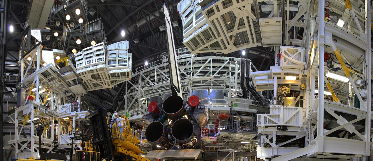 CAPE CANAVERAL, Fla. - A panoramic photo shows space shuttle Discovery during the main engine removal phase in Orbiter Processing Facility-2 at NASA's Kennedy Space Center in Florida. The removal is part of Discovery's transition and retirement processing. Work performed on Discovery is expected to help rocket designers build next-generation spacecraft and prepare the shuttle for future public display.        NASA/Frankie Martin