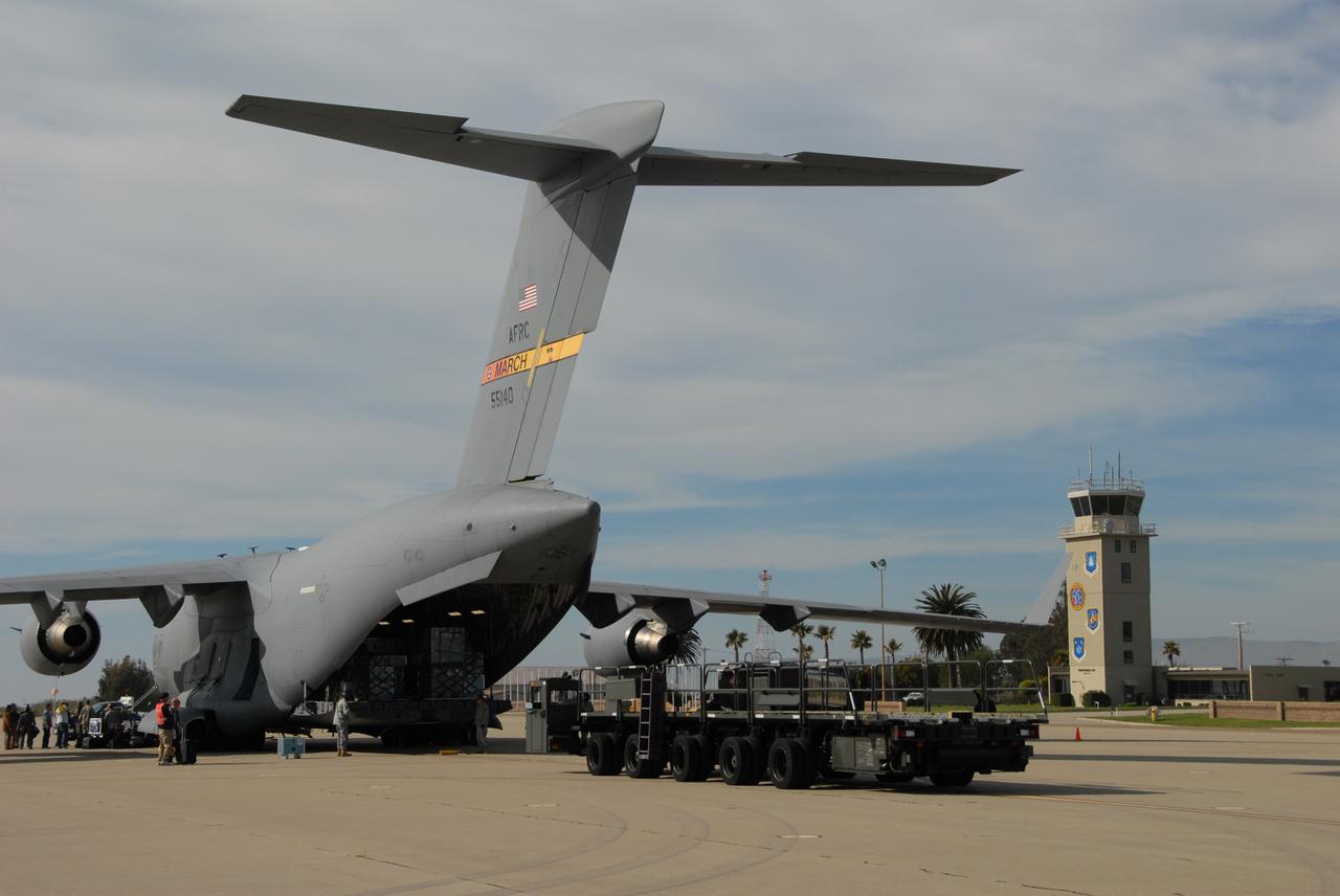 VANDENBERG AIR FORCE BASE, Calif. -- Workers at Vandenberg Air Force Base in California prepare to offload the Aquarius/SAC-D spacecraft from a U.S. Air Force C-17 transport plane. The aircraft traveled from Campos, Brazil. Following final tests, the spacecraft will be integrated to a United Launch Alliance Delta II rocket in preparation for the targeted June launch to low Earth orbit.      Aquarius, the NASA-built primary instrument on the SAC-D spacecraft, will map global changes in salinity at the ocean's surface. Salinity is a key measurement for understanding how changes in rainfall, evaporation and the melting of freezing of ice influence ocean circulation and are linked to variations in Earth's climate. The three-year mission will provide new insights into how variations in ocean surface salinity relate to these fundamental climate processes. Photo credit: VAFB/30th Space Wing