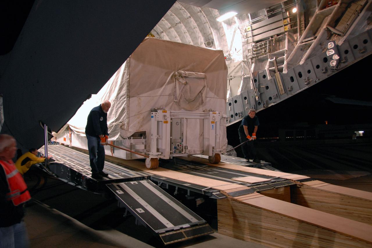 VANDENBERG AIR FORCE BASE, Calif. -- The Aquarius/SAC-D spacecraft is offloaded from a U.S. Air Force C-17 transport at Vandenberg Air Force Base in California. The aircraft traveled from Campos, Brazil. Following final tests, the spacecraft will be integrated to a United Launch Alliance Delta II rocket in preparation for the targeted June launch to low Earth orbit.        Aquarius, the NASA-built primary instrument on the SAC-D spacecraft, will map global changes in salinity at the ocean's surface. Salinity is a key measurement for understanding how changes in rainfall, evaporation and the melting of freezing of ice influence ocean circulation and are linked to variations in Earth's climate. The three-year mission will provide new insights into how variations in ocean surface salinity relate to these fundamental climate processes. Photo credit: VAFB/30th Space Wing
