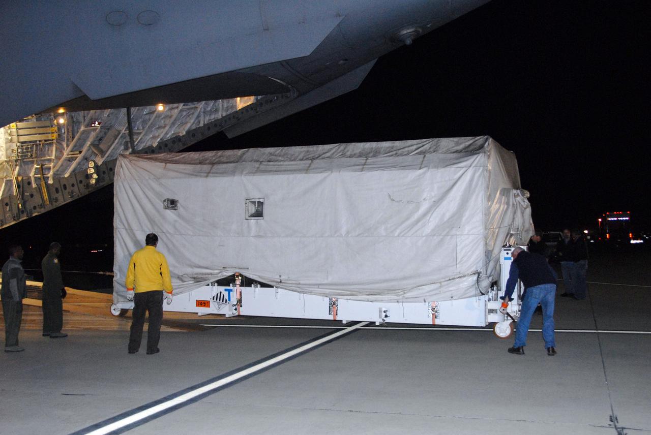 VANDENBERG AIR FORCE BASE, Calif. -- The Aquarius/SAC-D spacecraft is offloaded from a U.S. Air Force C-17 transport at Vandenberg Air Force Base in California. The aircraft traveled from Campos, Brazil. Following final tests, the spacecraft will be integrated to a United Launch Alliance Delta II rocket in preparation for the targeted June launch to low Earth orbit.        Aquarius, the NASA-built primary instrument on the SAC-D spacecraft, will map global changes in salinity at the ocean's surface. Salinity is a key measurement for understanding how changes in rainfall, evaporation and the melting of freezing of ice influence ocean circulation and are linked to variations in Earth's climate. The three-year mission will provide new insights into how variations in ocean surface salinity relate to these fundamental climate processes. Photo credit: VAFB/30th Space Wing