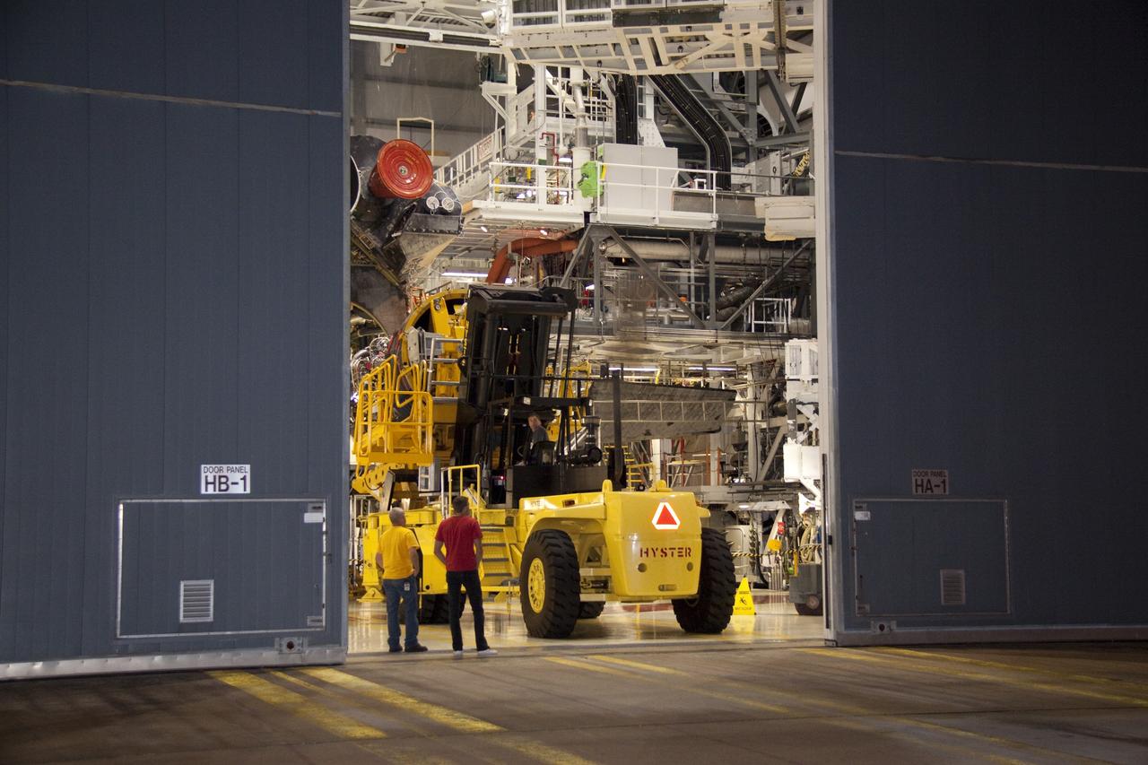 CAPE CANAVERAL, Fla. - Space shuttle main engine No. 2, which was removed from shuttle Discovery, will be transported from Orbiter Processing Facility-2 to the Space Shuttle Main Engine Processing Facility at NASA's Kennedy Space Center in Florida. The removal was part of Discovery's transition and retirement processing. Work performed on Discovery is expected to help rocket designers build next-generation spacecraft and prepare the shuttle for future public display. Photo credit: NASA/Jack Pfaller