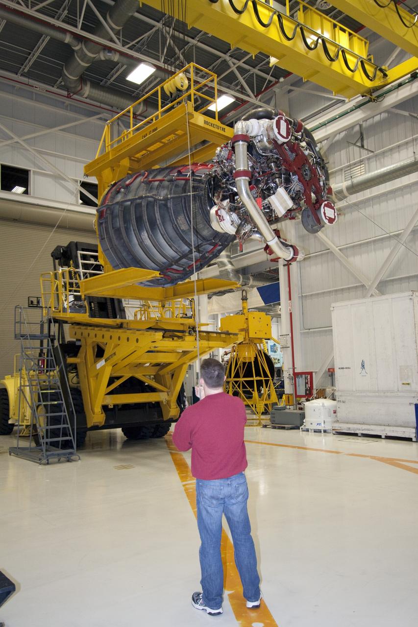 CAPE CANAVERAL, Fla. - Space shuttle main engine No. 2, which was removed from shuttle Discovery, is moved to a work stand for routine inspections in the Space Shuttle Main Engine Processing Facility at NASA's Kennedy Space Center in Florida. The removal was part of Discovery's transition and retirement processing. Work performed on Discovery is expected to help rocket designers build next-generation spacecraft and prepare the shuttle for future public display. Photo credit: NASA/Jack Pfaller