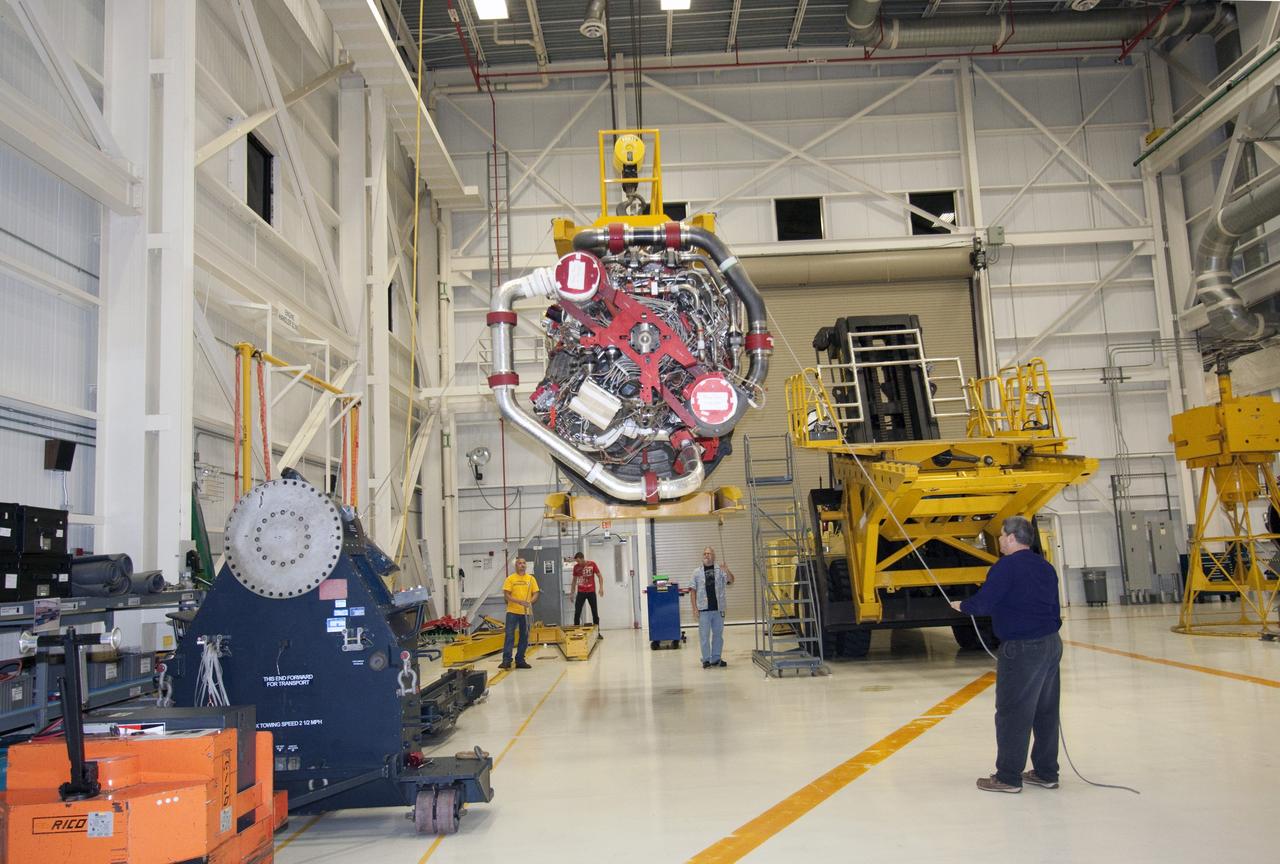 CAPE CANAVERAL, Fla. - Space shuttle main engine No. 2, which was removed from shuttle Discovery, is moved to a work stand for routine inspections in the Space Shuttle Main Engine Processing Facility at NASA's Kennedy Space Center in Florida. The removal was part of Discovery's transition and retirement processing. Work performed on Discovery is expected to help rocket designers build next-generation spacecraft and prepare the shuttle for future public display. Photo credit: NASA/Jack Pfaller