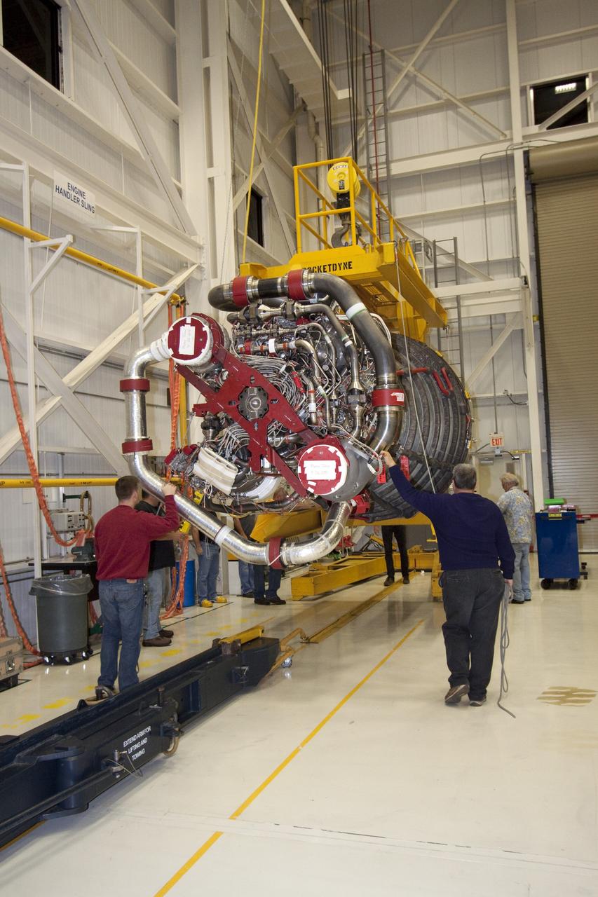 CAPE CANAVERAL, Fla. - Space shuttle main engine No. 2, which was removed from shuttle Discovery, is moved to a work stand for routine inspections in the Space Shuttle Main Engine Processing Facility at NASA's Kennedy Space Center in Florida. The removal was part of Discovery's transition and retirement processing. Work performed on Discovery is expected to help rocket designers build next-generation spacecraft and prepare the shuttle for future public display. Photo credit: NASA/Jack Pfaller