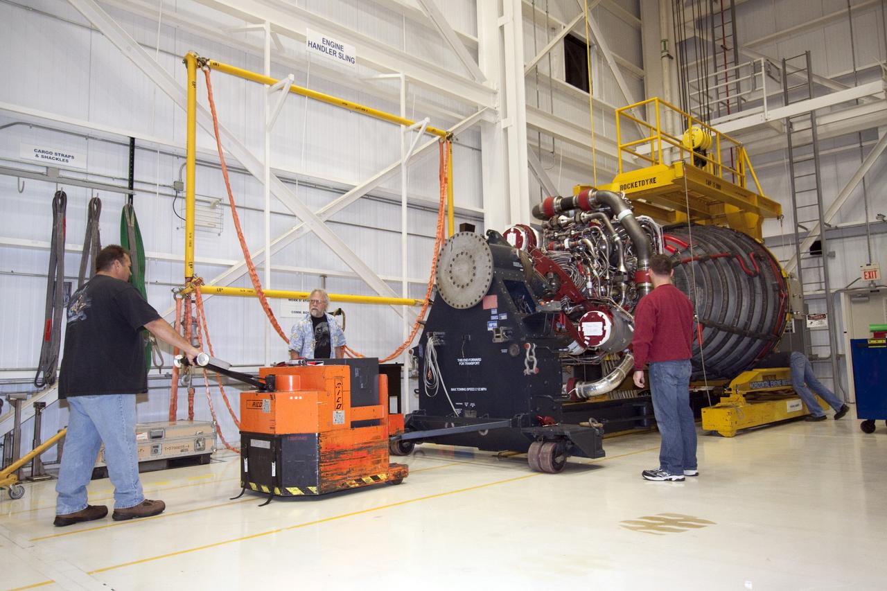 CAPE CANAVERAL, Fla. - Space shuttle main engine No. 2, which was removed from shuttle Discovery, will undergo routine inspections on a work stand in the Space Shuttle Main Engine Processing Facility at NASA's Kennedy Space Center in Florida. The removal was part of Discovery's transition and retirement processing. Work performed on Discovery is expected to help rocket designers build next-generation spacecraft and prepare the shuttle for future public display. Photo credit: NASA/Jack Pfaller