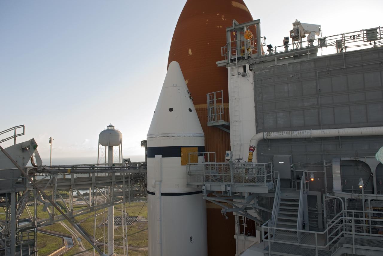 CAPE CANAVERAL, Fla. -- Technicians and engineers will perform a walk down and detailed inspections of space shuttle Endeavour following severe storms over Launch Pad 39A at NASA's Kennedy Space Center in Florida. The frontal system moved through Central Florida producing strong winds, heavy rain, frequent lightning and even funnel clouds. During the inspections, teams found only minor damage to Endeavour's external fuel tank foam insulation and evaluations indicate there was no damage to the spacecraft. Endeavour and its six-member STS-134 crew are targeted to launch April 29 at 3:47 p.m. EDT. They will deliver the Express Logistics Carrier-3, Alpha Magnetic Spectrometer-2 (AMS), a high-pressure gas tank, additional spare parts for the Dextre robotic helper and micrometeoroid debris shields to the International Space Station. This will be the final spaceflight for Endeavour. For more information visit, www.nasa.gov/mission_pages/shuttle/shuttlemissions/sts134/index.html. Photo credit: NASA/Jim Grossmann