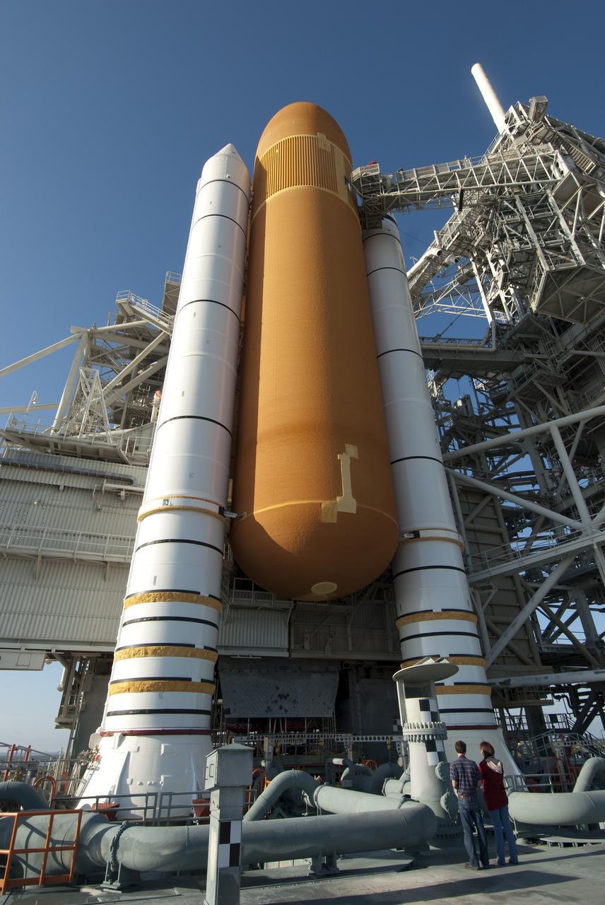 CAPE CANAVERAL, Fla. -- Workers perform a walk down of space shuttle Endeavour following severe storms over Launch Pad 39A at NASA's Kennedy Space Center in Florida. The frontal system moved through Central Florida producing strong winds, heavy rain, frequent lightning and even funnel clouds. During detailed inspections, technicians and engineers found only minor damage to Endeavour's external fuel tank foam insulation and evaluations indicate there was no damage to the spacecraft. Endeavour and its six-member STS-134 crew are targeted to launch April 29 at 3:47 p.m. EDT. They will deliver the Express Logistics Carrier-3, Alpha Magnetic Spectrometer-2 (AMS), a high-pressure gas tank, additional spare parts for the Dextre robotic helper and micrometeoroid debris shields to the International Space Station. This will be the final spaceflight for Endeavour. For more information visit, www.nasa.gov/mission_pages/shuttle/shuttlemissions/sts134/index.html. Photo credit: NASA/Jim Grossmann