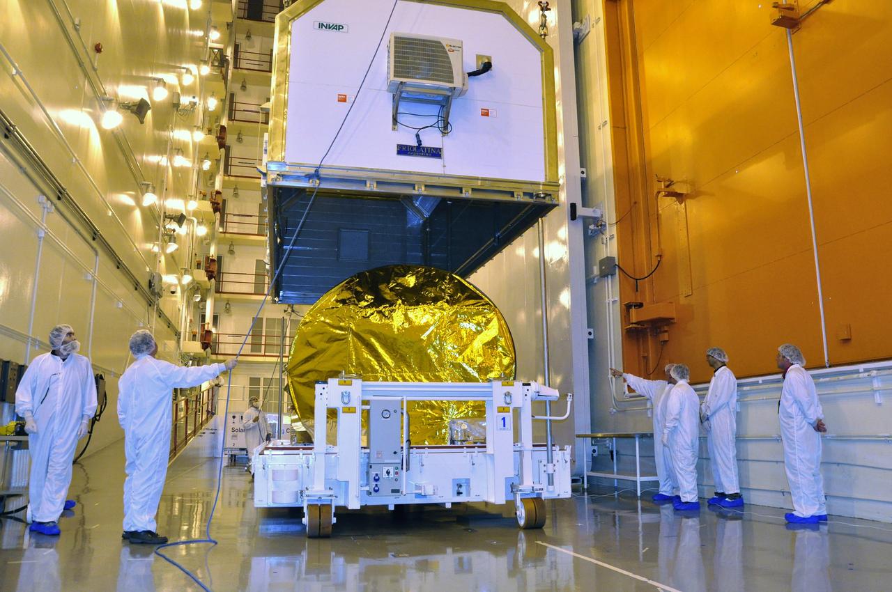 VANDENBERG AIR FORCE BASE, Calif. -- Technicians unpack and unveil the Aquarius/SAC-D spacecraft in the Spaceport Systems International payload processing facility at Vandenberg Air Force Base in California. The container protected the spacecraft on its journey from Campos, Brazil, aboard a U.S. Air Force C-17 transport plane. Following final tests, the spacecraft will be integrated to a United Launch Alliance Delta II rocket in preparation for the targeted June launch to low Earth orbit.      Aquarius, the NASA-built primary instrument on the SAC-D spacecraft, will map global changes in salinity at the ocean's surface. Salinity is a key measurement for understanding how changes in rainfall, evaporation and the melting of freezing of ice influence ocean circulation and are linked to variations in Earth's climate. The three-year mission will provide new insights into how variations in ocean surface salinity relate to these fundamental climate processes. Photo credit: NASA/Randy Beaudoin, VAFB