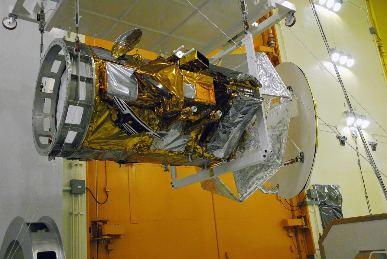VANDENBERG AIR FORCE BASE, Calif. -- An overhead crane lifts the Aquarius/SAC-D spacecraft from its stand by an overhead to cell 3 at the Spaceport Systems International payload processing facility at Vandenberg Air Force Base in California. There, the spacecraft will undergo inspection of its solar arrays and tests will be conducted on its propulsion subsystem. Further testing of the satellites various other systems will follow.          Following final tests, the spacecraft will be integrated to a United Launch Alliance Delta II rocket in preparation for the targeted June launch. Aquarius, the NASA-built primary instrument on the SAC-D spacecraft, will map global changes in salinity at the ocean's surface. The three-year mission will provide new insights into how variations in ocean surface salinity relate to these fundamental climate processes. Photo credit: NASA/Randy Beaudoin, VAFB