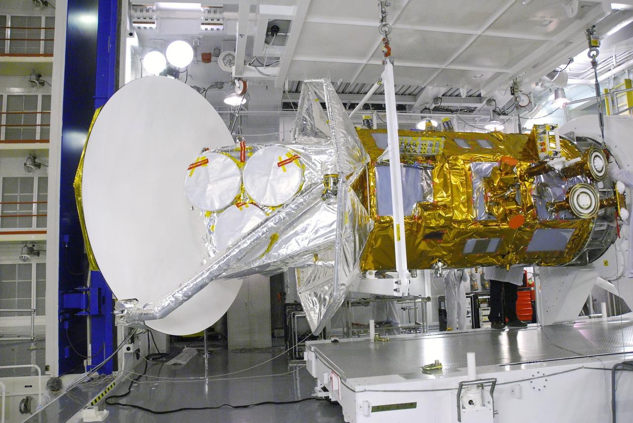VANDENBERG AIR FORCE BASE, Calif. -- A technician secures the Aquarius/SAC-D spacecraft to the Rotation and Test Fixture in cell 3 at the Spaceport Systems International payload processing facility at Vandenberg Air Force Base in California. There, the spacecraft will undergo inspection of its solar arrays and tests will be conducted on its propulsion subsystem. Further testing of the satellites various other systems will follow.  Following final tests, the spacecraft will be integrated to a United Launch Alliance Delta II rocket in preparation for the targeted June launch. Aquarius, the NASA-built primary instrument on the SAC-D spacecraft, will map global changes in salinity at the ocean's surface. The three-year mission will provide new insights into how variations in ocean surface salinity relate to these fundamental climate processes. Photo credit: NASA/Randy Beaudoin, VAFB