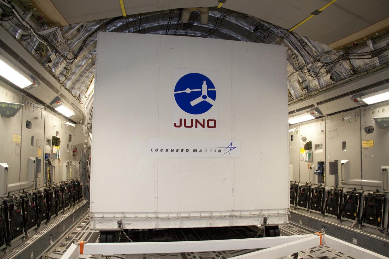 CAPE CANAVERAL, Fla. -- NASA's Juno spacecraft arrives at Kennedy Space Center's Shuttle Landing Facility in Florida aboard an Air Force C-17 jet. Juno was shipped from Lockheed Martin Space Systems in Denver and will be transported to Astrotech's payload processing facility in Titusville, Fla. to begin final preparations for launch.              The solar-powered spacecraft will orbit Jupiter's poles 33 times to find out more about the gas giant's origins, structure, atmosphere and magnetosphere and investigate the existence of a solid planetary core. Juno is scheduled to launch aboard an Atlas V rocket from Cape Canaveral, Fla. Aug. 5. For more information visit, www.nasa.gov/juno. Photo credit: NASA/Jack Pfaller