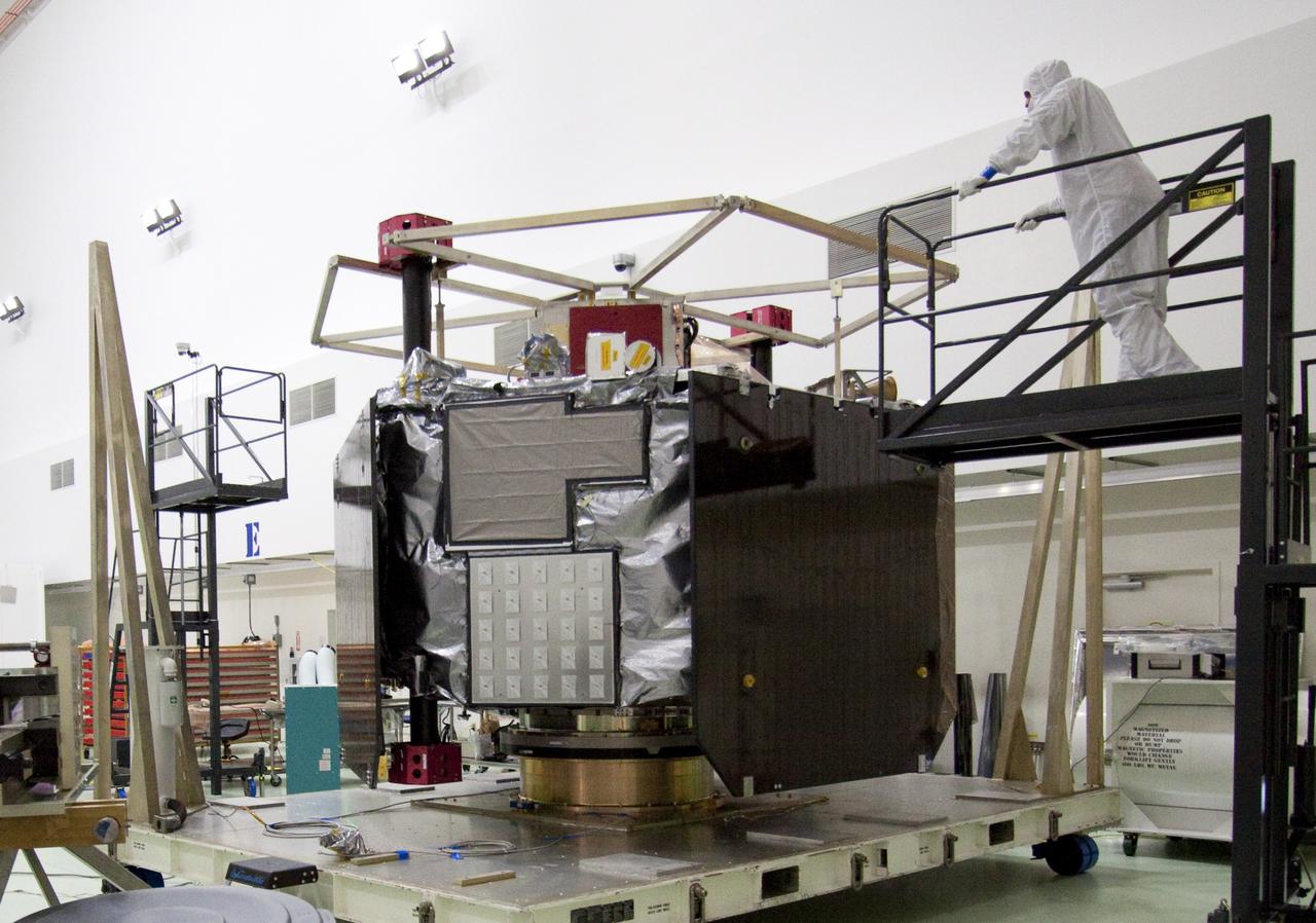 CAPE CANAVERAL, Fla. -- Lockheed-Martin technicians at Astrotech's payload processing facility in Titusville, Fla. have removed the protective wrapping from NASA's Juno spacecraft and begin an inspection prior to final testing and preparations for launch.        The solar-powered spacecraft will orbit Jupiter's poles 33 times to find out more about the gas giant's origins, structure, atmosphere and magnetosphere and investigate the existence of a solid planetary core. Juno is scheduled to launch aboard an Atlas V rocket from Cape Canaveral, Fla. Aug. 5. For more information visit, www.nasa.gov/juno. Photo credit: NASA/Jack Pfaller    It will splash down into the Atlantic Ocean where the ship and its crew will recover it and tow it back through Port Canaveral for refurbishing for another launch. The STS-124 mission is the second of three flights launching components to complete the Japan Aerospace Exploration Agency's Kibo laboratory. The shuttle crew will install Kibo's large Japanese Pressurized Module and its remote manipulator system, or RMS. Photo credit: USA/Jeff Suter