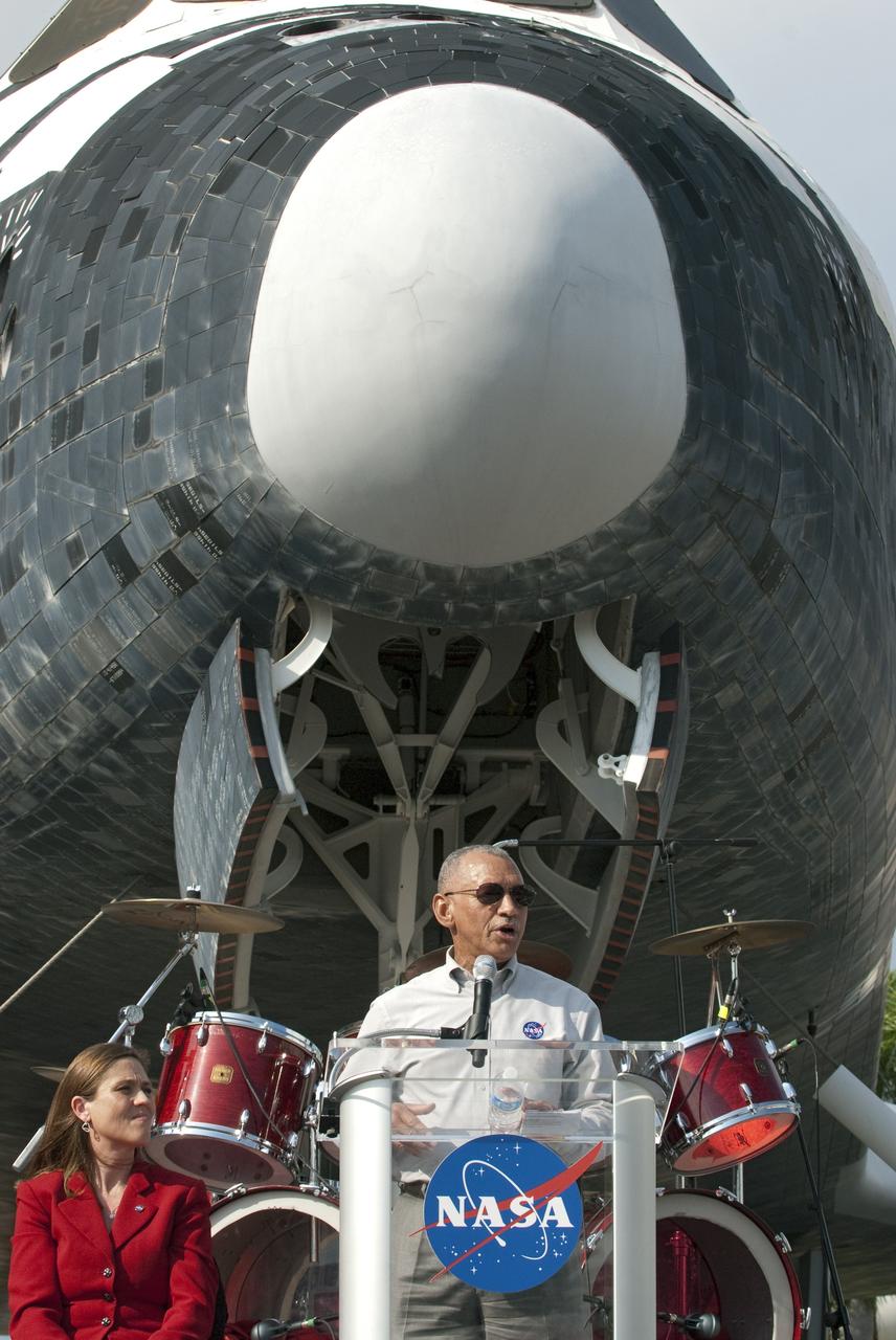 CAPE CANAVERAL, Fla. -- Standing in front of a replica of a space shuttle at NASA's Kennedy Space Center Visitor Complex in Florida, NASA Administrator Charles Bolden speaks to the audience attending a 30th anniversary celebration in honor of the Space Shuttle Program's first shuttle launch.        The celebration followed an announcement by NASA Administrator Charles Bolden where the four orbiters will be placed for permanent display after retirement. Photo credit: NASA/Kim Shiflett