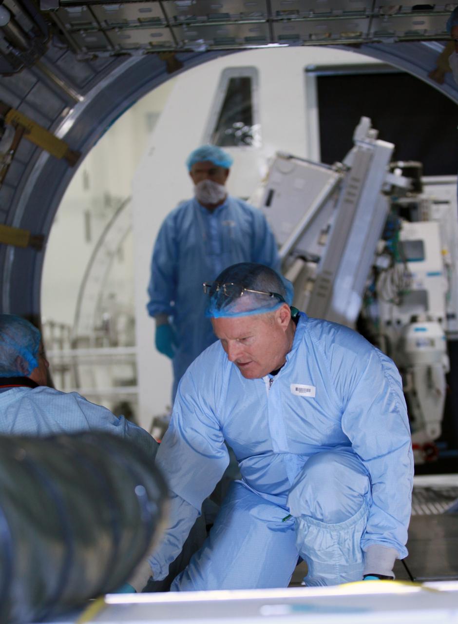 CAPE CANAVERAL, Fla. -- In the Space Station Processing Facility at NASA's Kennedy Space Center in Florida, technicians install cargo inside the Raffaello multi-purpose logistics module for shuttle Atlantis' flight to the International Space Station.      Atlantis and its payload is being prepared for the STS-135 mission, which will deliver the Raffaello multi-purpose logistics module packed with supplies and spare parts to the station. Atlantis is targeted to launch June 28, and will be the last shuttle flight for the Space Shuttle Program. For more information visit, http://www.nasa.gov/mission_pages/shuttle/shuttlemissions/sts135/index.html. Photo credit: NASA/Frankie Martin