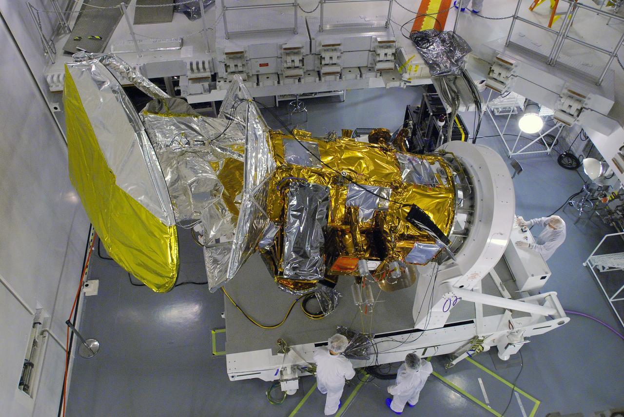VANDENBERG AIR FORCE BASE, Calif. -- In Space Systems International's Payload Processing Facility at Vandenberg Air Force Base in California, technicians begin to rotate the Aquarius/SAC-D spacecraft into a vertical position for testing.         Following final tests, the spacecraft will be integrated to a United Launch Alliance Delta II rocket in preparation for the targeted June launch. Aquarius, the NASA-built primary instrument on the SAC-D spacecraft, will provide new insights into how variations in ocean surface salinity relate to fundamental climate processes on its three-year mission. Photo credit: NASA/Dan Liberotti, VAFB