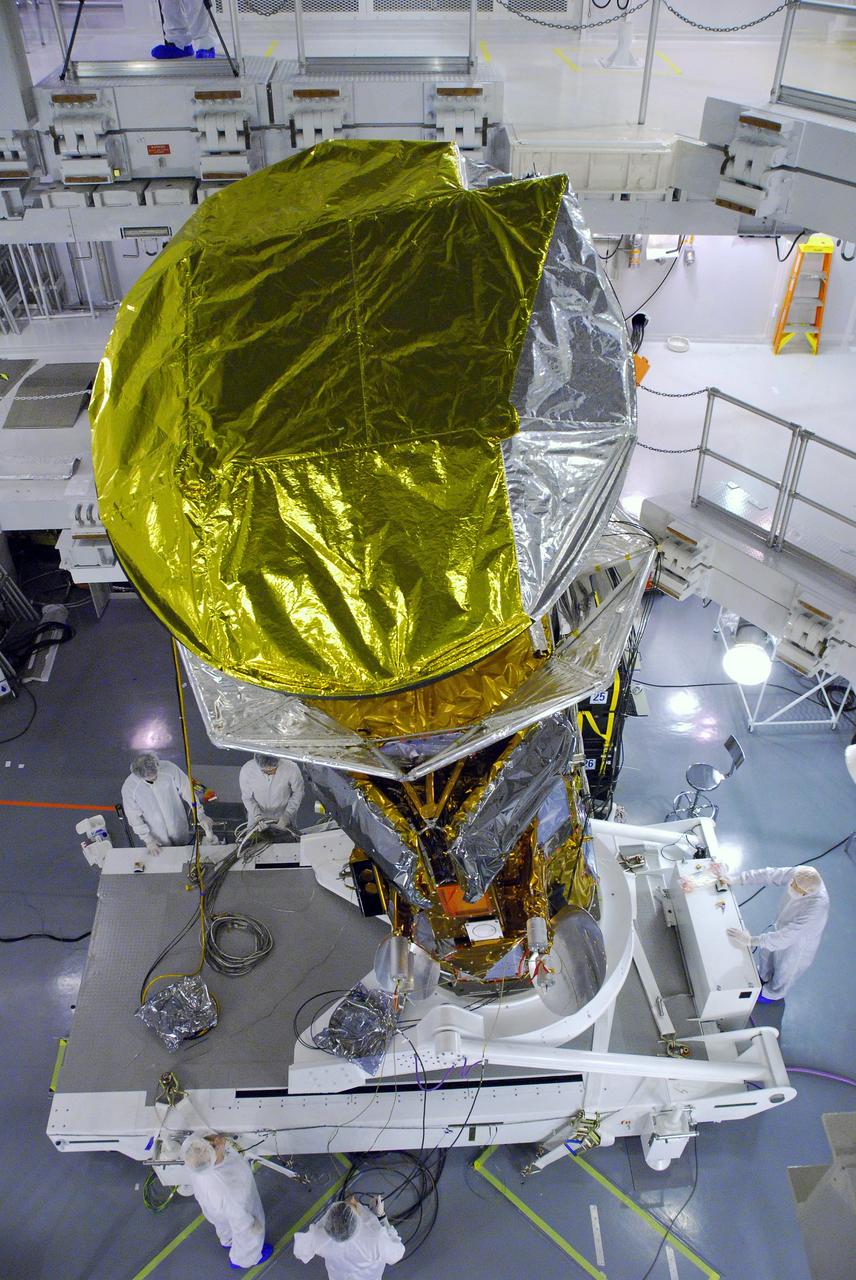 VANDENBERG AIR FORCE BASE, Calif. -- In Space Systems International's Payload Processing Facility at Vandenberg Air Force Base in California, technicians are rotating the Aquarius/SAC-D spacecraft into a vertical position for testing.       Following final tests, the spacecraft will be integrated to a United Launch Alliance Delta II rocket in preparation for the targeted June launch. Aquarius, the NASA-built primary instrument on the SAC-D spacecraft, will provide new insights into how variations in ocean surface salinity relate to fundamental climate processes on its three-year mission. Photo credit: NASA/Dan Liberotti, VAFB