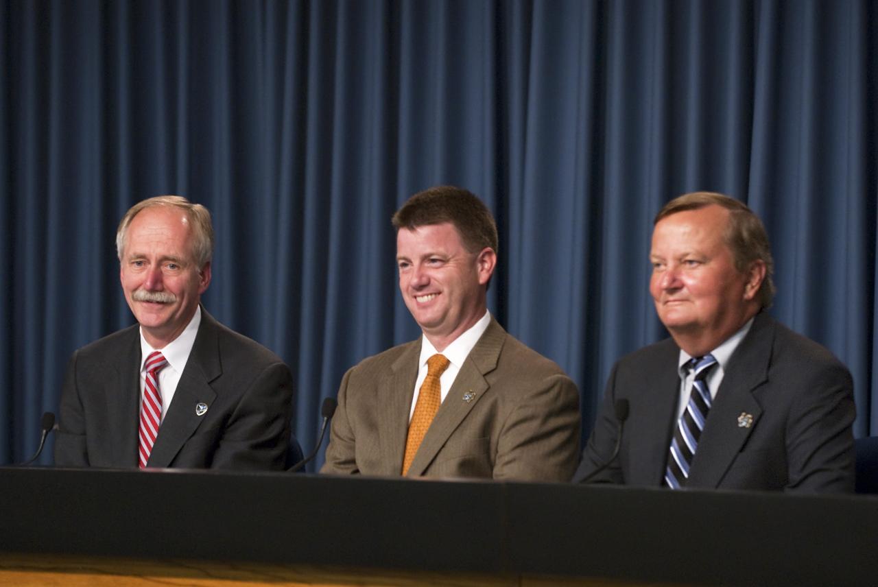 CAPE CANAVERAL, Fla. -- In the post-Flight Readiness Review news conference for the STS-134 mission, Bill Gerstenmaier, associate administrator for Space Operations (left), Mike Moses, Space Shuttle Program launch integration manager, and Mike Leinbach shuttle launch director, present the items discussed by managers. They confirmed an April 29 launch date for space shuttle Endeavour and its crew of six to the International Space Station. Endeavour will deliver the Express Logistics Carrier-3, Alpha Magnetic Spectrometer-2 (AMS), a high-pressure gas tank and additional spare parts for the Dextre robotic helper to the station. This will be the final spaceflight for Endeavour. For more information visit, www.nasa.gov/mission_pages/shuttle/shuttlemissions/sts134/index.html. Photo credit: NASA/Kim Shiflett