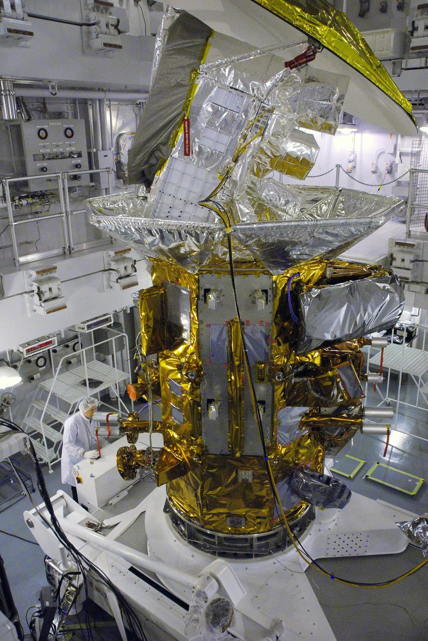 VANDENBERG AIR FORCE BASE, Calif. -- In Space Systems International's Payload Processing Facility at Vandenberg Air Force Base in California, technicians prepare to rotate the  Aquarius/SAC-D spacecraft from a vertical to horizontal position for testing. Following final tests, the spacecraft will be integrated to a United Launch Alliance Delta II rocket in preparation for the targeted June launch. Aquarius, the NASA-built primary instrument on the SAC-D spacecraft, will provide new insights into how variations in ocean surface salinity relate to fundamental climate processes on its three-year mission.  Photo credit: NASA/Randy Beaudoin, VAFB