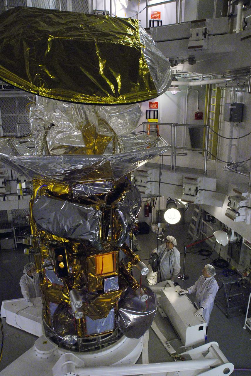 VANDENBERG AIR FORCE BASE, Calif. -- In Space Systems International's Payload Processing Facility at Vandenberg Air Force Base in California, technicians prepare to rotate the Aquarius/SAC-D spacecraft from a vertical to horizontal position for testing. Following final tests, the spacecraft will be integrated to a United Launch Alliance Delta II rocket in preparation for the targeted June launch. Aquarius, the NASA-built primary instrument on the SAC-D spacecraft, will provide new insights into how variations in ocean surface salinity relate to fundamental climate processes on its three-year mission.  Photo credit: NASA/Randy Beaudoin, VAFB