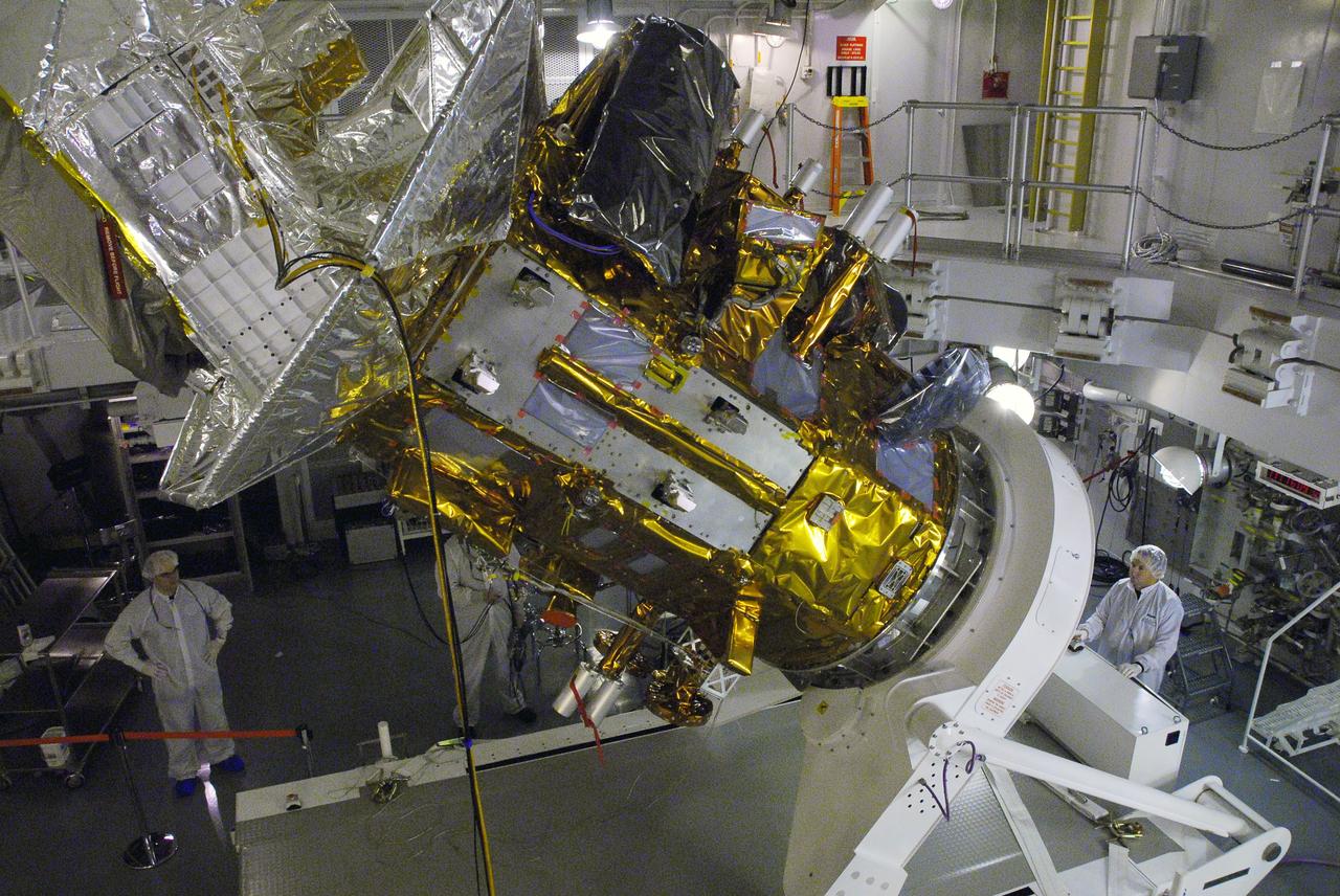 VANDENBERG AIR FORCE BASE, Calif. -- In Space Systems International's Payload Processing Facility at Vandenberg Air Force Base in California, technicians are rotating the Aquarius/SAC-D spacecraft from a vertical to horizontal position for testing. Following final tests, the spacecraft will be integrated to a United Launch Alliance Delta II rocket in preparation for the targeted June launch. Aquarius, the NASA-built primary instrument on the SAC-D spacecraft, will provide new insights into how variations in ocean surface salinity relate to fundamental climate processes on its three-year mission. Photo credit: NASA/Randy Beaudoin, VAFB