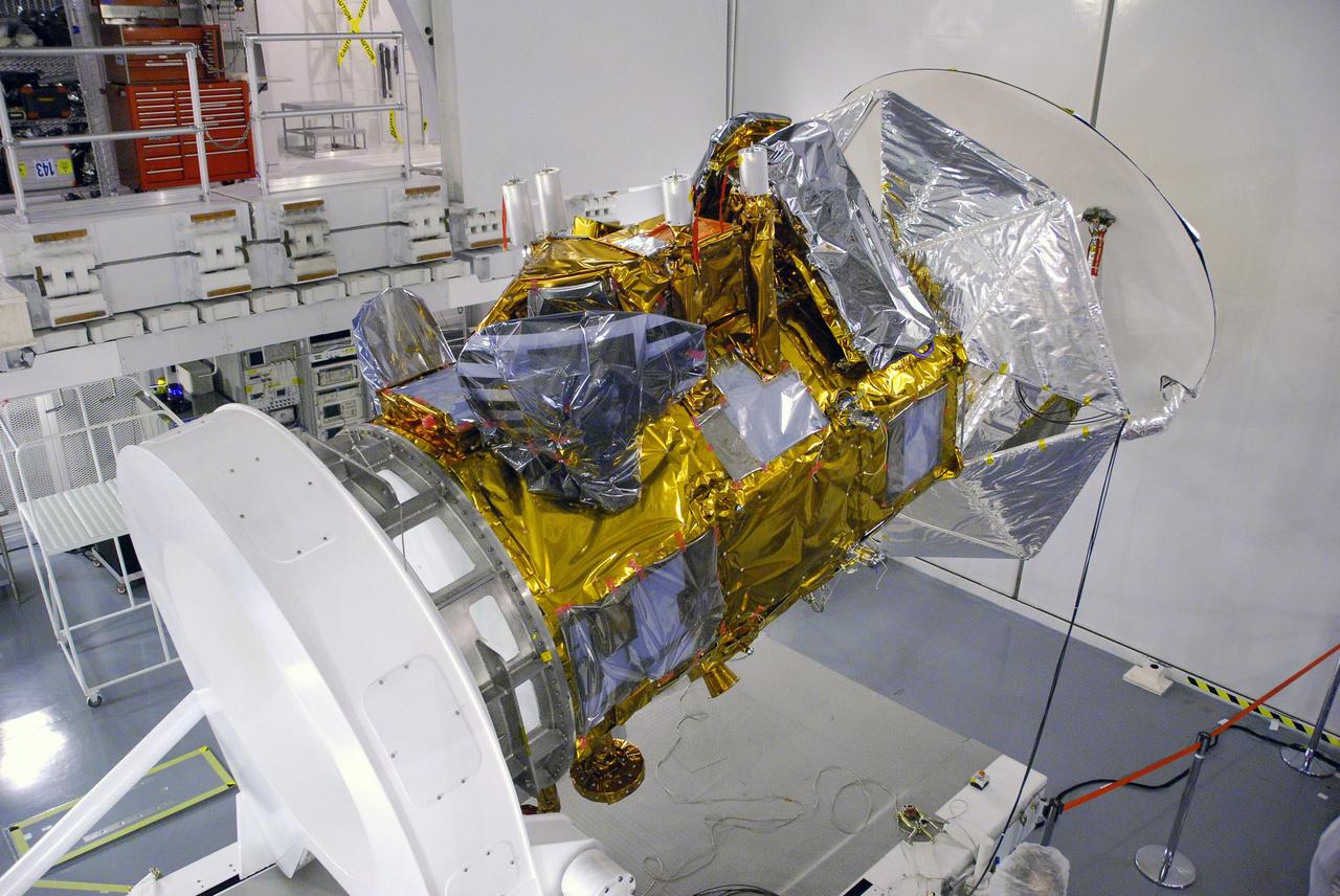 VANDENBERG AIR FORCE BASE, Calif. -- In Space Systems International's Payload Processing Facility at Vandenberg Air Force Base in California, technicians are rotating the  Aquarius/SAC-D spacecraft from a vertical to horizontal position for testing. Following final tests, the spacecraft will be integrated to a United Launch Alliance Delta II rocket in preparation for the targeted June launch. Aquarius, the NASA-built primary instrument on the SAC-D spacecraft, will provide new insights into how variations in ocean surface salinity relate to fundamental climate processes on its three-year mission. Photo credit: NASA/Randy Beaudoin, VAFB