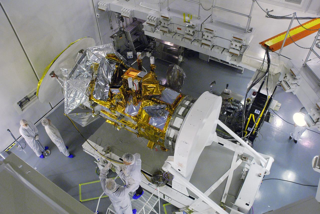 VANDENBERG AIR FORCE BASE, Calif. -- In Space Systems International's Payload Processing Facility at Vandenberg Air Force Base in California, technicians have rotated the   Aquarius/SAC-D spacecraft into a horizontal position for testing. Following final tests, the spacecraft will be integrated to a United Launch Alliance Delta II rocket in preparation for the targeted June launch. Aquarius, the NASA-built primary instrument on the SAC-D spacecraft, will provide new insights into how variations in ocean surface salinity relate to fundamental climate processes on its three-year mission. Photo credit: NASA/Randy Beaudoin, VAFB