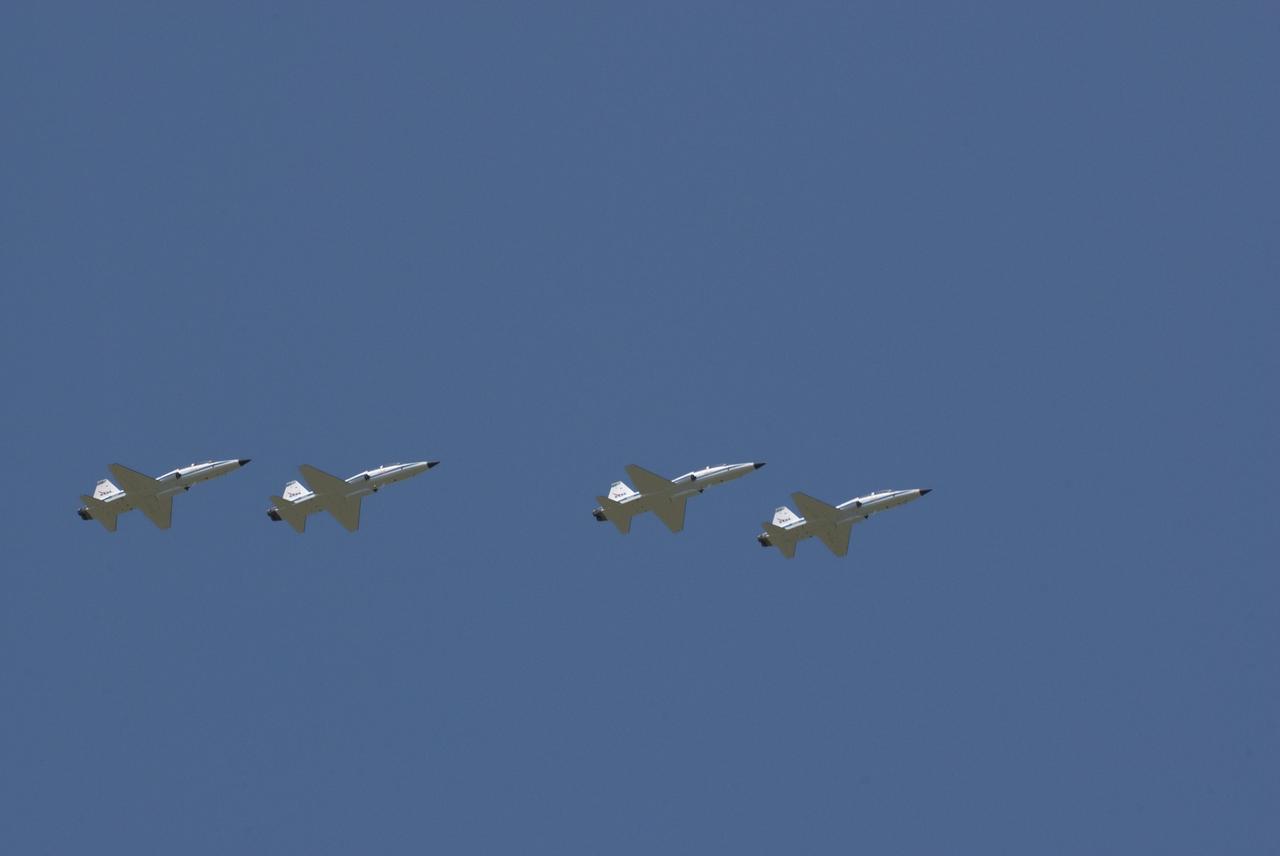 CAPE CANAVERAL, Fla. -- High above NASA's Kennedy Space Center in Florida, space shuttle Endeavour's STS-134 crew members get ready to land their T-38 jets at the Shuttle Landing Facility. The crew arrived at Kennedy 12:52 p.m. EDT to get ready for Endeavour's launch to the International Space Station scheduled for Friday, April 29 at 3:47 p.m. Endeavour and its crew will deliver the Express Logistics Carrier-3, Alpha Magnetic Spectrometer-2 (AMS), a high-pressure gas tank and additional spare parts for the Dextre robotic helper to the station. This will be the final spaceflight for Endeavour. For more information visit, www.nasa.gov/mission_pages/shuttle/shuttlemissions/sts134/index.html. Photo credit: NASA/Kim Shiflett