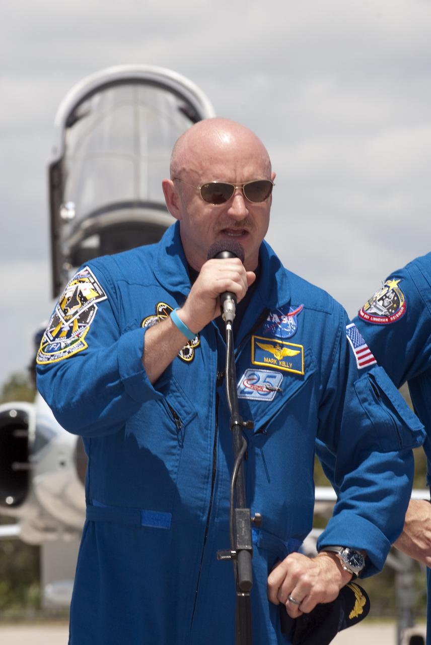CAPE CANAVERAL, Fla. -- After arrival at the Shuttle Landing Facility at NASA's Kennedy Space Center in Florida, Commander Mark Kelly speaks to the media. The STS-134 crew members landed at 12:52 p.m. EDT to get ready for space shuttle Endeavour's launch to the International Space Station scheduled for Friday, April 29 at 3:47 p.m. Endeavour and its crew will deliver the Express Logistics Carrier-3, Alpha Magnetic Spectrometer-2 (AMS), a high-pressure gas tank and additional spare parts for the Dextre robotic helper to the station. This will be the final spaceflight for Endeavour. For more information visit, www.nasa.gov/mission_pages/shuttle/shuttlemissions/sts134/index.html. Photo credit: NASA/Kim Shiflett
