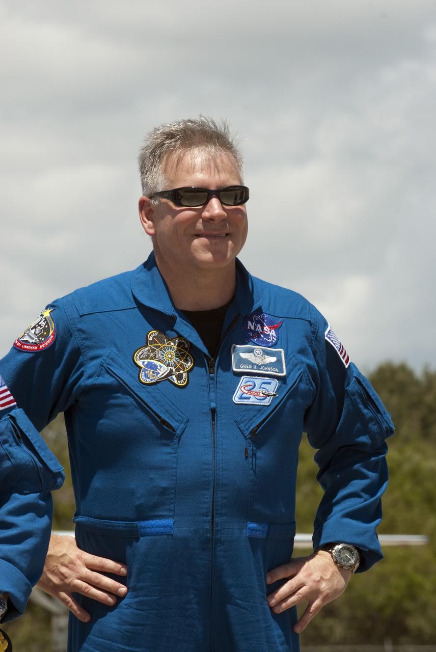 CAPE CANAVERAL, Fla. -- At the Shuttle Landing Facility at NASA's Kennedy Space Center in Florida, Pilot Greg H. Johnson is photographed after his arrival. The STS-134 crew members landed at 12:52 p.m. EDT to get ready for space shuttle Endeavour's launch to the International Space Station scheduled for Friday, April 29 at 3:47 p.m. Endeavour and its crew will deliver the Express Logistics Carrier-3, Alpha Magnetic Spectrometer-2 (AMS), a high-pressure gas tank and additional spare parts for the Dextre robotic helper to the station. This will be the final spaceflight for Endeavour. For more information visit, www.nasa.gov/mission_pages/shuttle/shuttlemissions/sts134/index.html. Photo credit: NASA/Kim Shiflett