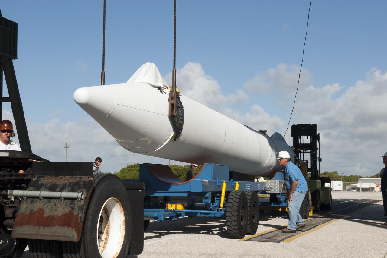 CAPE CANAVERAL, Fla. -- A solid-fueled booster is lifted off a trailer at Launch Complex 17-B at Cape Canaveral Air Force Station in Florida where a United Launch Alliance Delta II is being prepared for launch. The Delta II will carry NASA's Gravity Recovery and Interior Laboratory, or GRAIL, spacecraft into lunar orbit. The GRAIL mission is a part of NASA's Discovery Program. GRAIL will fly twin spacecraft in tandem orbits around the moon for several months to measure its gravity field. The mission also will answer longstanding questions about Earth's moon and provide scientists a better understanding of how Earth and other rocky planets in the solar system formed. GRAIL is scheduled to launch September 8, 2011. For more information visit: http://science.nasa.gov/missions/grail/. Photo credit: NASA/Jim Grossmann