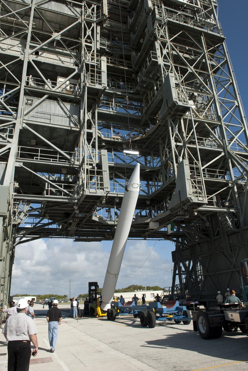 CAPE CANAVERAL, Fla. -- A solid-fueled booster is lifted off a trailer at Launch Complex 17-B at Cape Canaveral Air Force Station in Florida where a United Launch Alliance Delta II is being prepared for launch. The Delta II will carry NASA's Gravity Recovery and Interior Laboratory, or GRAIL, spacecraft into lunar orbit. The GRAIL mission is a part of NASA's Discovery Program. GRAIL will fly twin spacecraft in tandem orbits around the moon for several months to measure its gravity field. The mission also will answer longstanding questions about Earth's moon and provide scientists a better understanding of how Earth and other rocky planets in the solar system formed. GRAIL is scheduled to launch September 8, 2011. For more information visit: http://science.nasa.gov/missions/grail/. Photo credit: NASA/Jim Grossmann