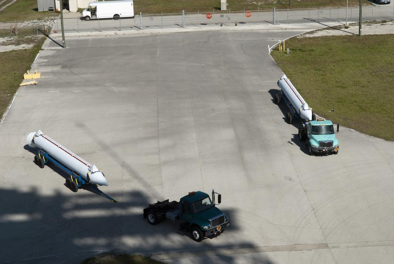 CAPE CANAVERAL, Fla. -- Trucks deliver the first set of solid-fueled boosters to Launch Complex 17-B at Cape Canaveral Air Force Station in Florida where a United Launch Alliance Delta II is being prepared for launch. The Delta II will carry NASA's Gravity Recovery and Interior Laboratory, or GRAIL, spacecraft into lunar orbit. The GRAIL mission is a part of NASA's Discovery Program. GRAIL will fly twin spacecraft in tandem orbits around the moon for several months to measure its gravity field. The mission also will answer longstanding questions about Earth's moon and provide scientists a better understanding of how Earth and other rocky planets in the solar system formed. GRAIL is scheduled to launch September 8, 2011. For more information visit: http://science.nasa.gov/missions/grail/. Photo credit: NASA/Jim Grossmann