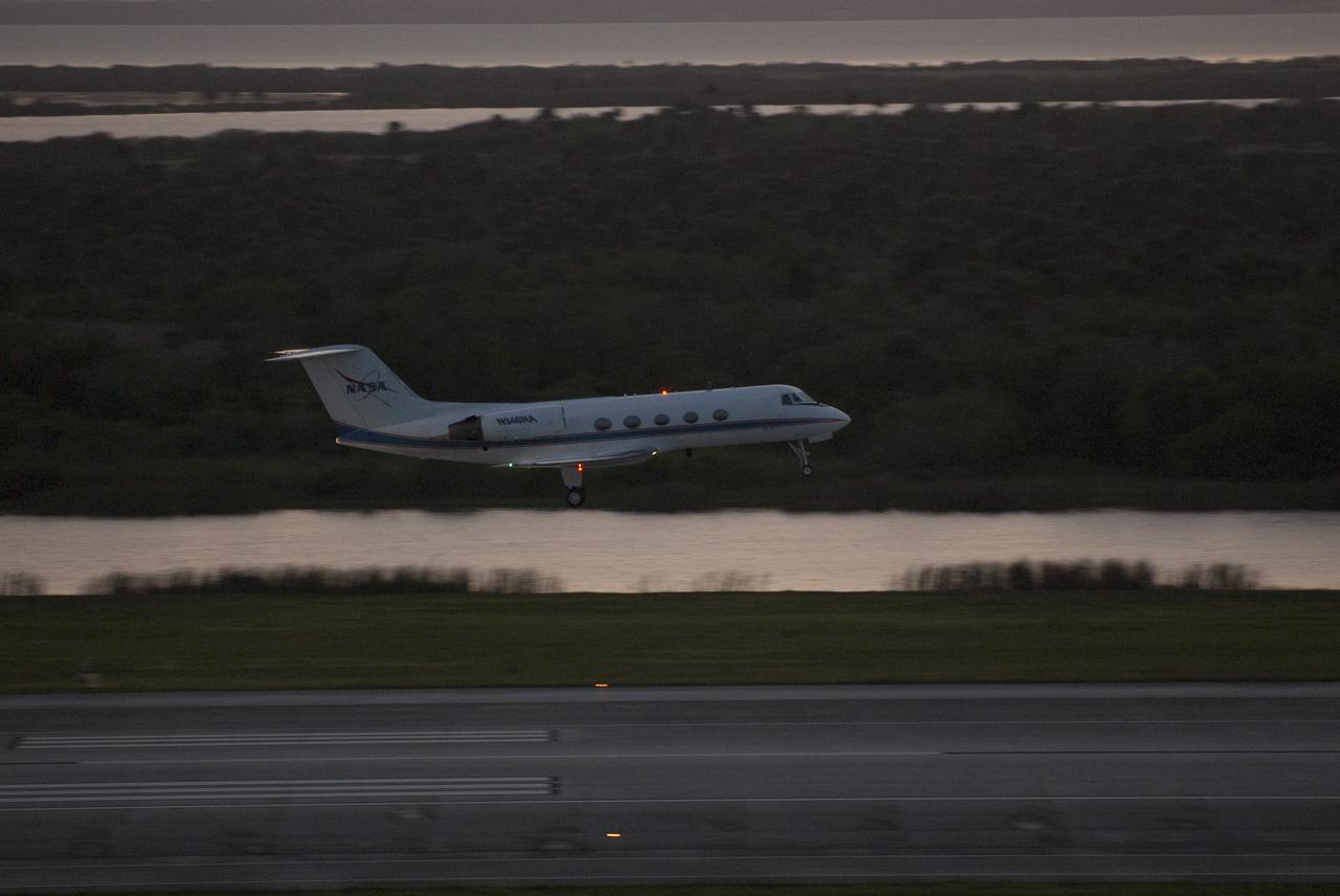 CAPE CANAVERAL, Fla. -- STS-134 Commander Mark Kelly and Pilot Greg H. Johnson perform touch-and-go landings aboard a Shuttle Training Aircraft (STA) on the Shuttle Landing Facility runway at NASA's Kennedy Space Center in Florida. An STA is a Gulfstream II jet that is modified to mimic the shuttle's handling during the final phase of landing. Kelly and Johnson will practice landings as part of standard training before space shuttle Endeavour's launch to the International Space Station. Endeavour and its crew will deliver the Express Logistics Carrier-3, Alpha Magnetic Spectrometer-2 (AMS), a high-pressure gas tank and additional spare parts for the Dextre robotic helper to the station. This will be the final spaceflight for Endeavour. For more information visit, www.nasa.gov/mission_pages/shuttle/shuttlemissions/sts134/index.html. Photo credit: NASA/Kim Shiflett