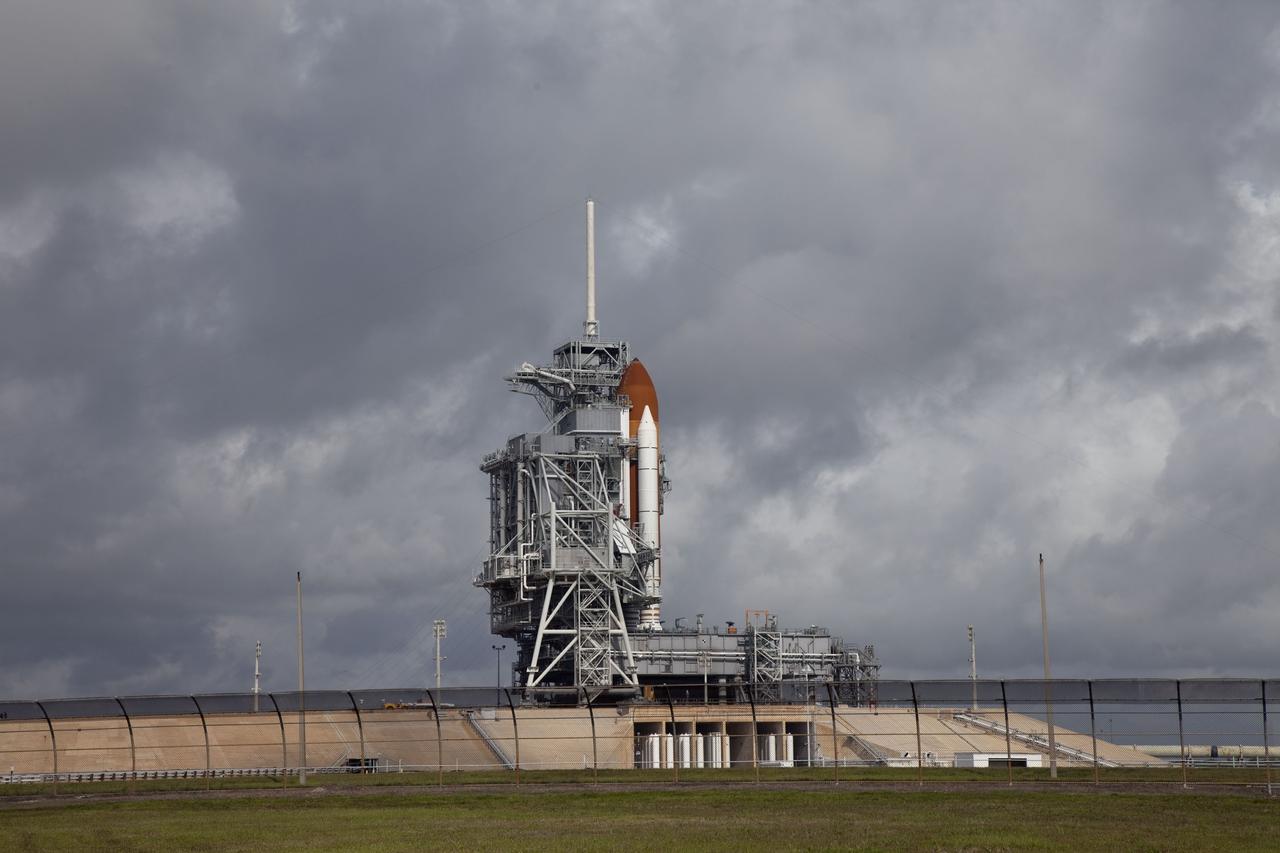 CAPE CANAVERAL, Fla. -- Space shuttle Endeavour majestically awaits liftoff on Launch Pad 39A at NASA's Kennedy Space Center in Florida. The rotating service structure (RSS) surrounds the shuttle for protection and to provide access but will be retracted before launch. Endeavour and its crew will deliver the Express Logistics Carrier-3, Alpha Magnetic Spectrometer-2 (AMS), a high-pressure gas tank and additional spare parts for the Dextre robotic helper to the International Space Station. Launch is scheduled for April 29 at 3:47 p.m. EDT. This will be the final spaceflight for Endeavour. For more information visit, www.nasa.gov/mission_pages/shuttle/shuttlemissions/sts134/index.htmlPhoto credit: NASA/Frank Michaux
