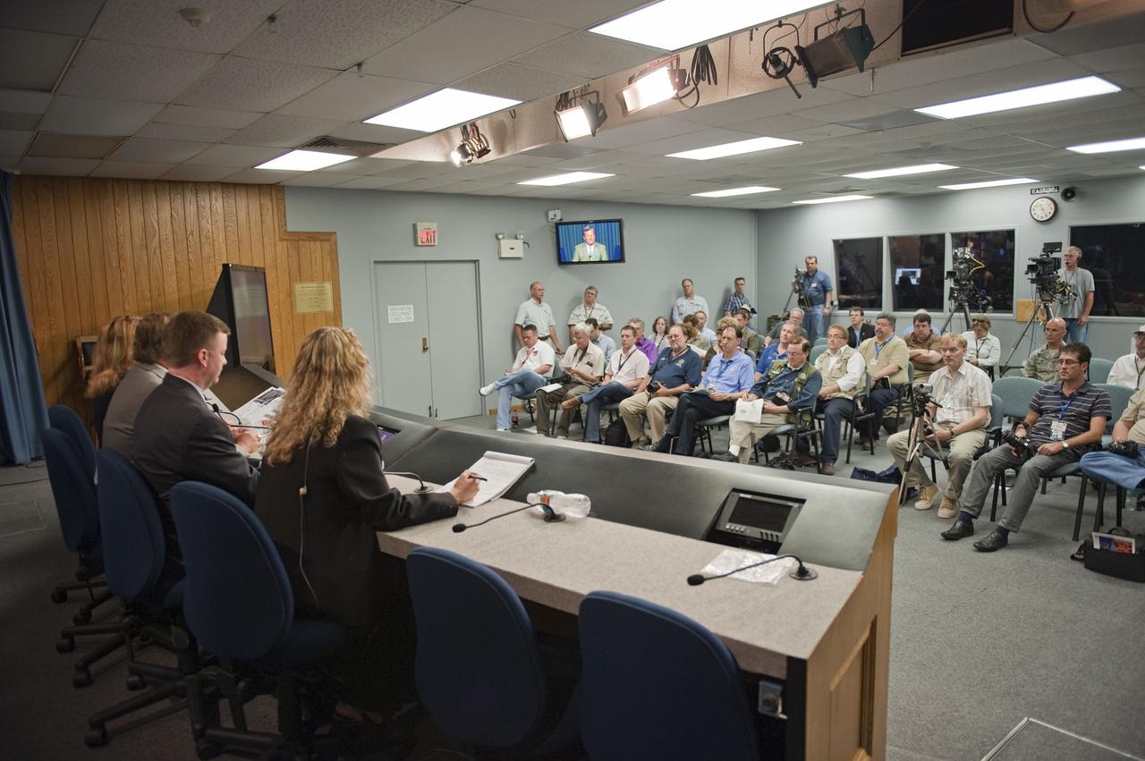 CAPE CANAVERAL, Fla. -- In the Press Site auditorium at NASA's Kennedy Space Center in Florida, NASA managers brief media about the launch status of space shuttle Endeavour's STS-134 mission. From left are NASA Public Affairs Officer Candrea Thomas, Space Shuttle Program Launch Integration Manager, Mike Moses, Shuttle Launch Director, Mike Leinbach, and Shuttle Weather Officer, Kathy Winters. Endeavour and its crew will deliver the Express Logistics Carrier-3, Alpha Magnetic Spectrometer-2 (AMS), a high-pressure gas tank and additional spare parts for the Dextre robotic helper to the International Space Station. Launch is scheduled for April 29 at 3:47 p.m. EDT. This will be the final spaceflight for Endeavour. For more information visit, www.nasa.gov/mission_pages/shuttle/shuttlemissions/sts134/index.html. Photo credit: NASA/Kim Shiflett