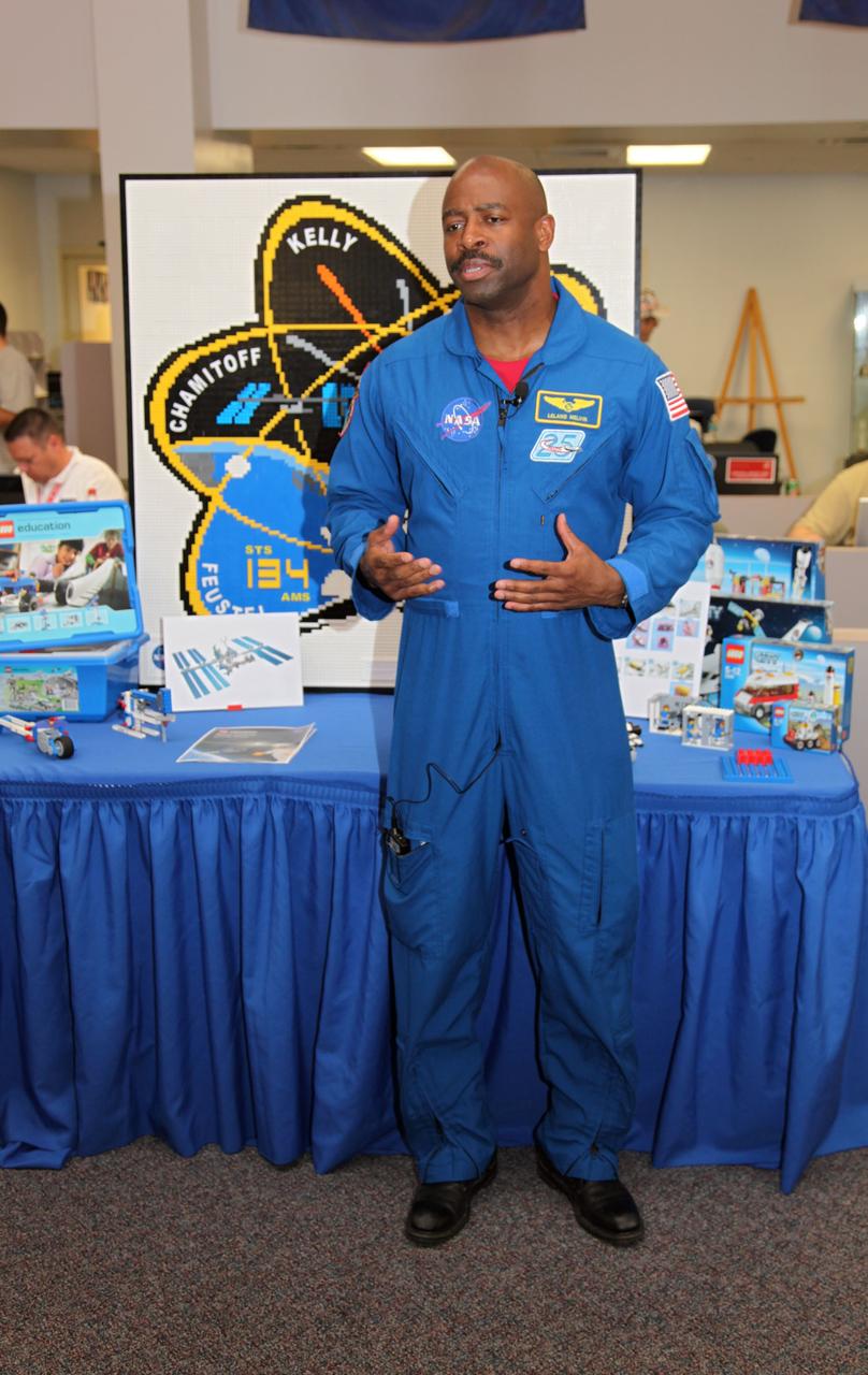 CAPE CANAVERAL, Fla. -- In the Press Site bull pen at NASA's Kennedy Space Center in Florida, NASA's Associate Administrator for Education Leland Melvin talks about the LEGO sets going up to the International Space Station (ISS) aboard space shuttle Endeavour's STS-134 mission. NASA and The LEGO Group will send 23 LEGO sets to the station and some of those sets include a space shuttle, an ISS model, a Global Positioning Satellite and NASA's Hubble Space Telescope. The sets will be used for NASA's Teaching From Space Project, which is part of a three-year Space Act Agreement with the toy maker to spark the interest of children in science, technology, engineering and mathematics (STEM). Liftoff is scheduled for April 29 at 3:47 p.m. EDT. This will be the final spaceflight for Endeavour. For more information visit, www.nasa.gov/mission_pages/shuttle/shuttlemissions/sts134/index.html. Photo credit: NASA/Frankie Martin