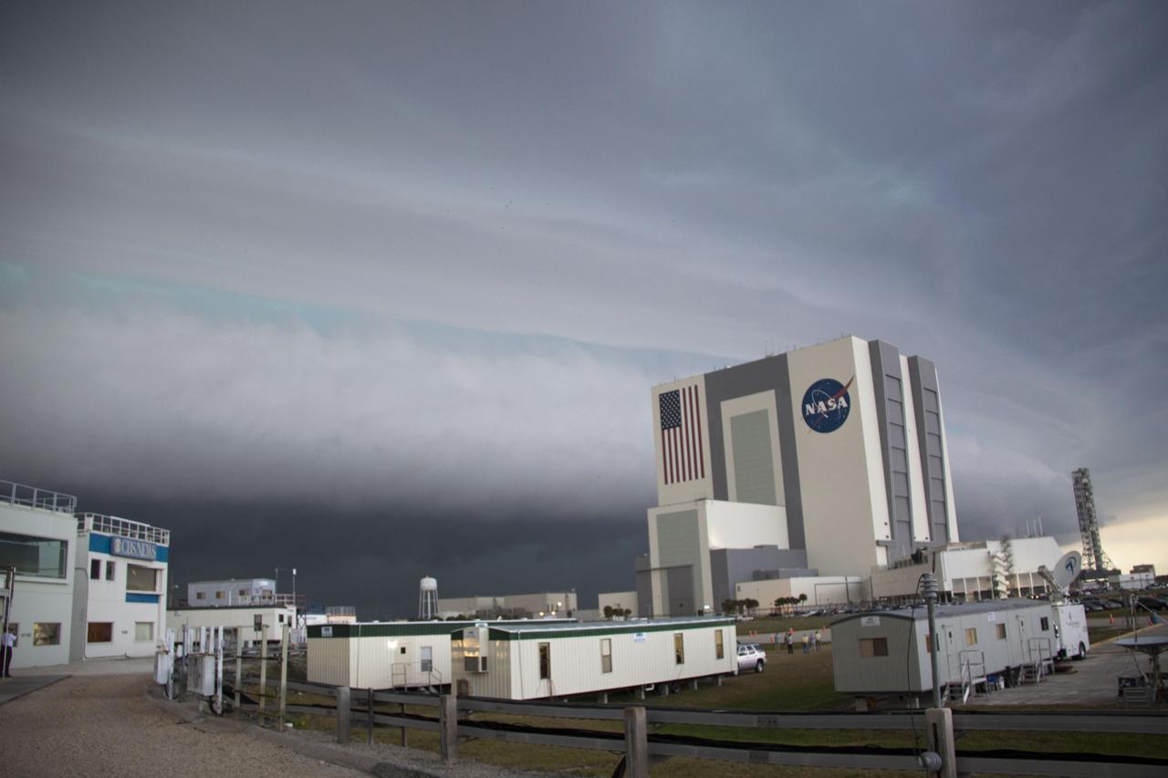 CAPE CANAVERAL, Fla. - Severe weather begins to roll over NASA's Kennedy Space Center in Florida on the night launch teams planned to move the rotating service structure (RSS) away from space shuttle Endeavour on Launch Pad 39A. The structure provides weather protection and access to the shuttle while it awaits lift off on the pad. RSS "rollback," as it's called, was delayed by nearly five hours to allow the storms to move offshore. Endeavour and the STS-134 crew will deliver the Express Logistics Carrier-3, Alpha Magnetic Spectrometer-2 (AMS), a high-pressure gas tank and additional spare parts for the Dextre robotic helper to the International Space Station. Endeavour was scheduled to launch at 3:47 p.m. on April 29, but that attempt was scrubbed for at least 72 hours while engineers assess an issue associated with the shuttle's Auxiliary Power Unit 1. STS-134 will be the final spaceflight for Endeavour. For more information visit, www.nasa.gov/mission_pages/shuttle/shuttlemissions/sts134/index.html. Photo credit: NASA/Troy Cryder